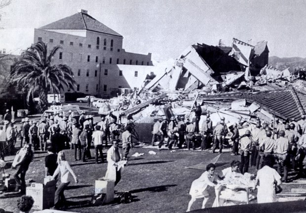 The 1971 San Fernando earthquake (also known as Sylmar earthquake) struck the San Fernando Valley near Sylmar at 6:00:55 a.m. PST on February 9, 1971, with a magnitude of 6.6. This scene is of the rescue efforts at the collapsed Vetreans Hospital in Sylmar where most of the 64 deaths occurred. (Daily News File Photos.)