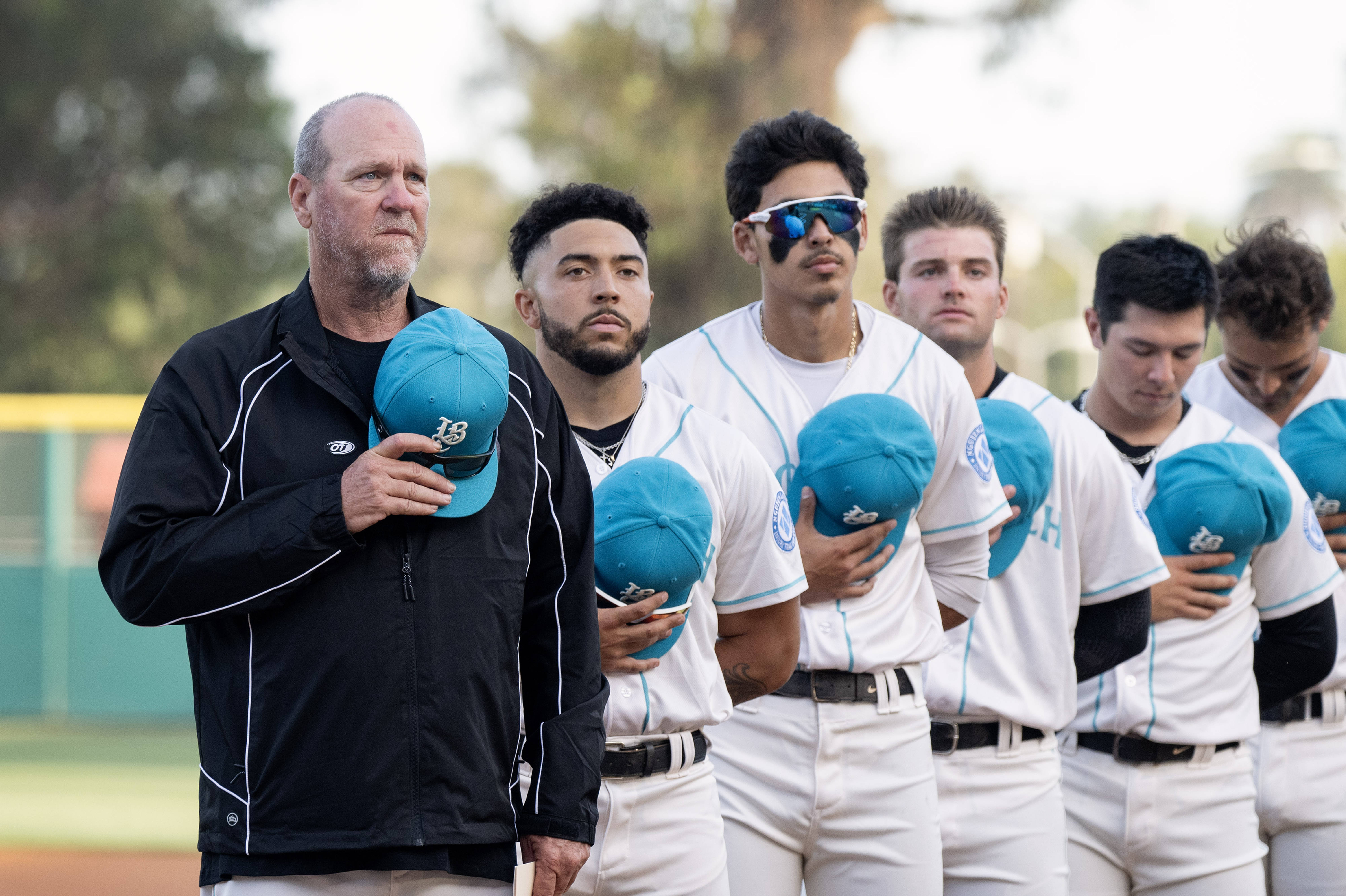 Manager Troy Percival, left, and the Long Beach Coast compete...