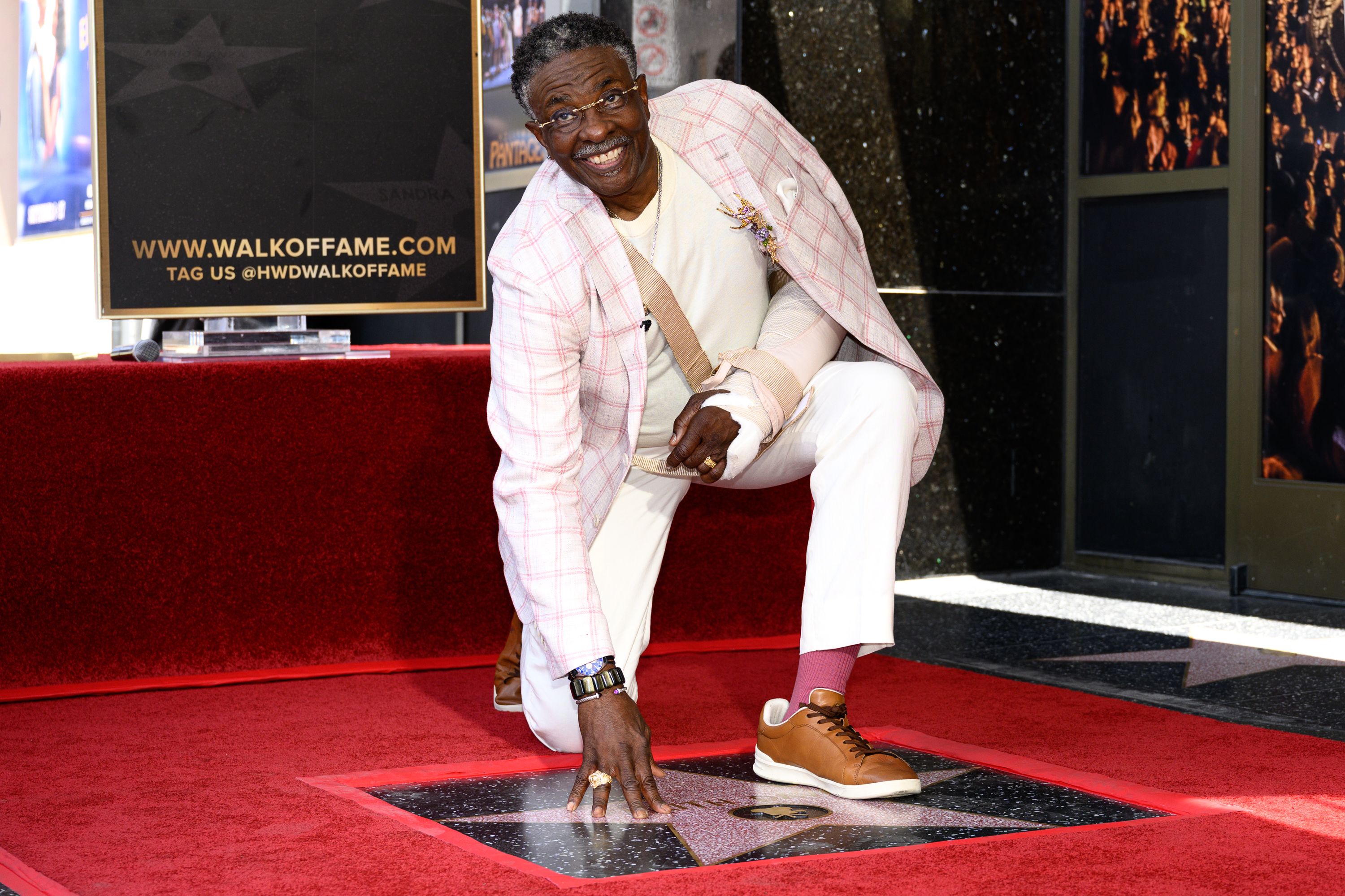 Keith David poses with his new star on the Hollywood...