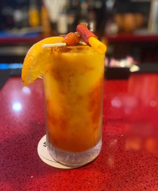 Micheladas Mex Grill serves a mango Michelada. (Photo by Richard Guzman)