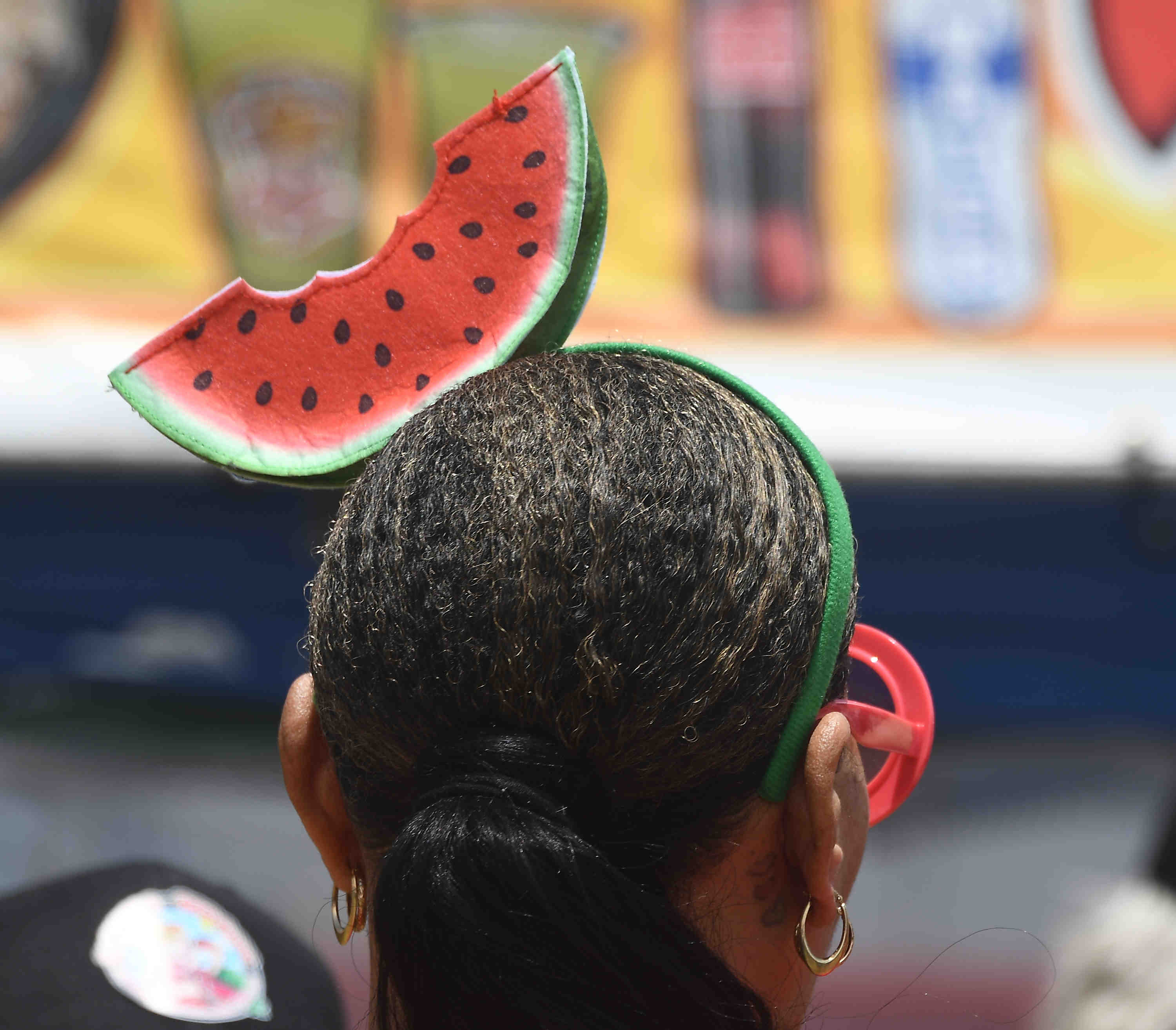 People showoff their watermelon fashion during the California watermelon festival...
