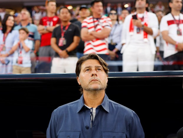 U.S. coach Mauricio Pochettino listens to the national anthem before his team played Turkey in the World Cup at SoFi Stadium in Inglewood. (K.C. Alfred / The San Diego Union-Tribune)