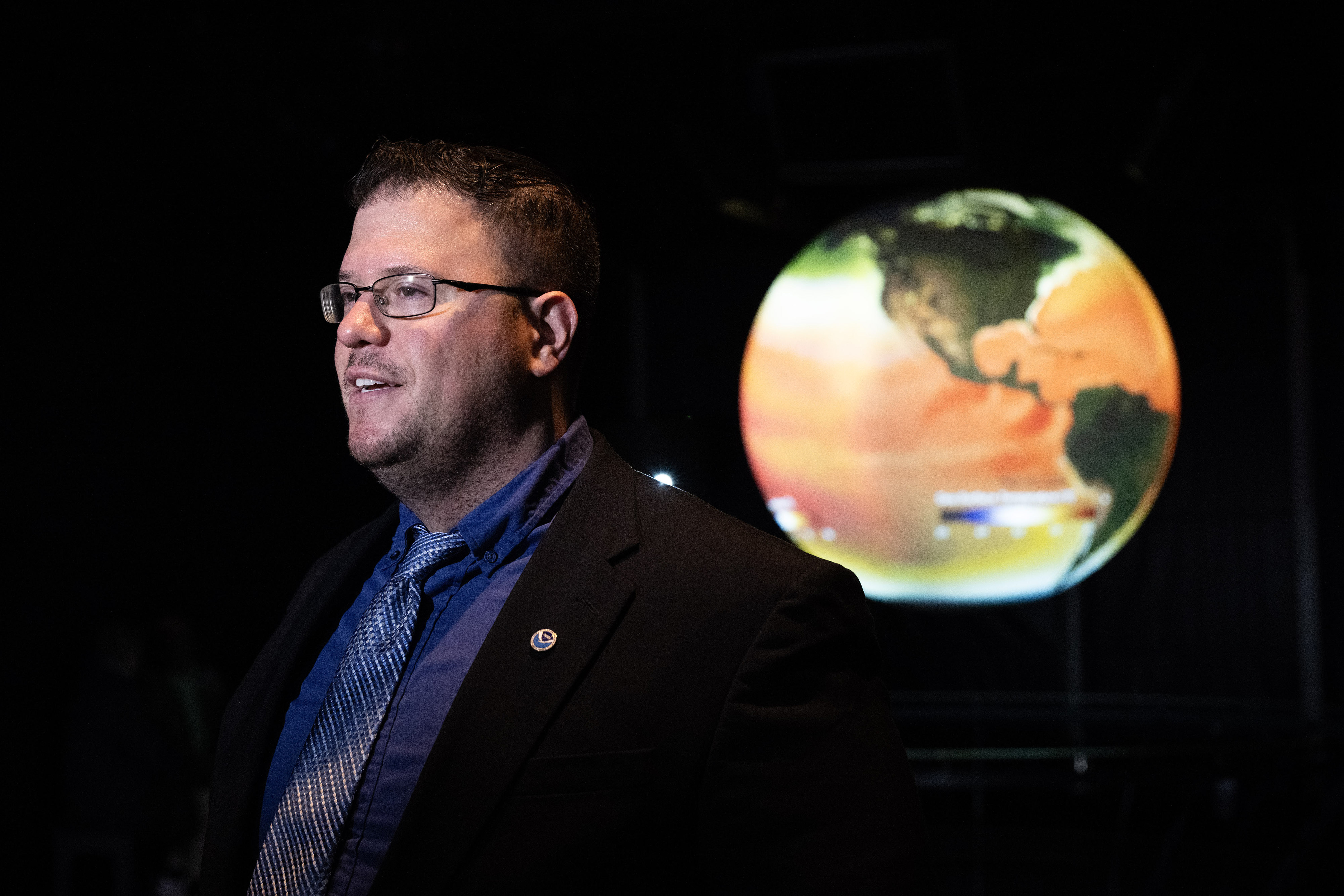 Meteorologist Dr. Ariel Cohen takes questions during a press briefing...