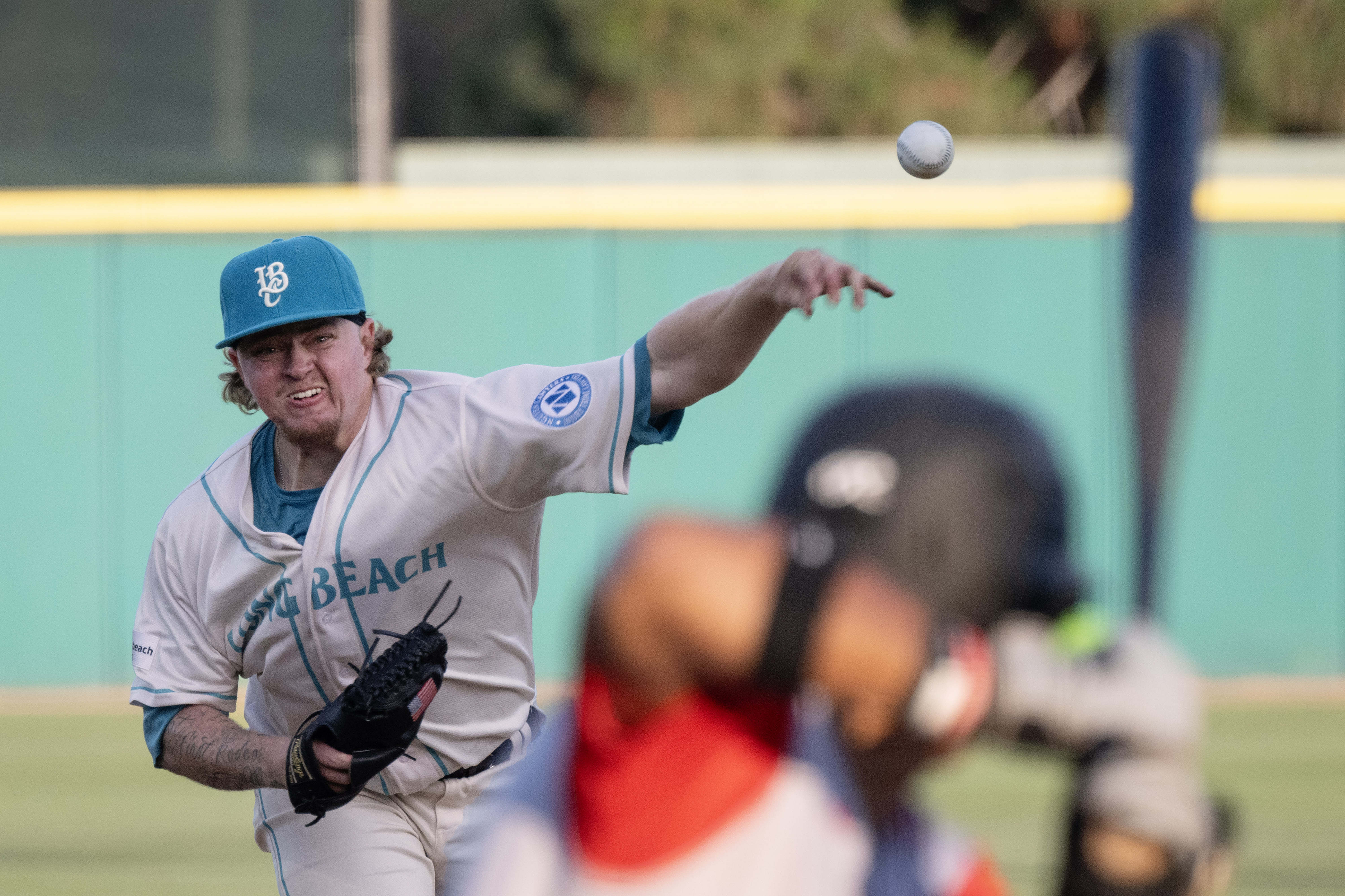 Long Beach Coastâs Brett Wozniak throws a strike against the...