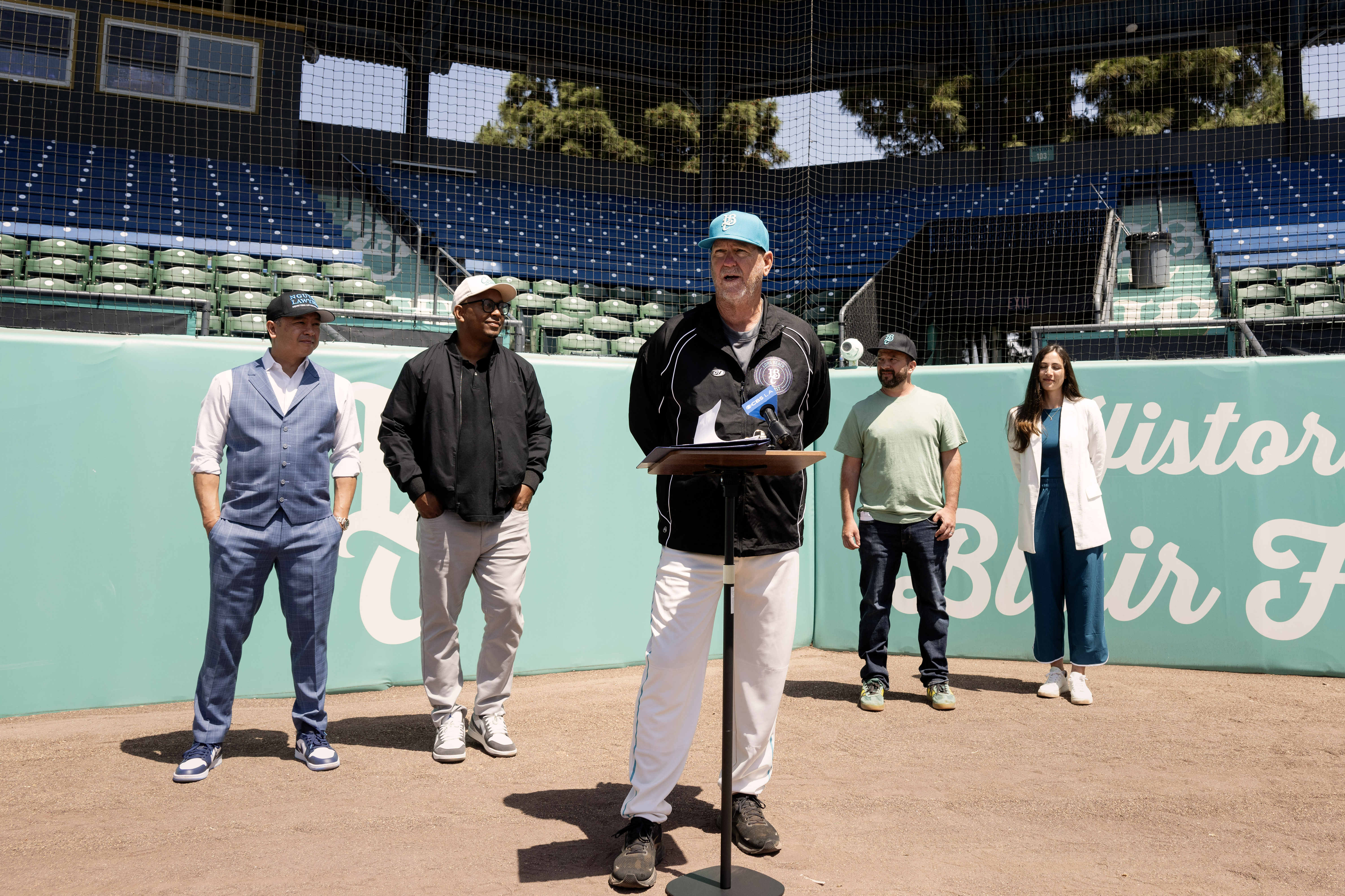 Long Beach Coast Manager Troy Percival, center, speaks during a...