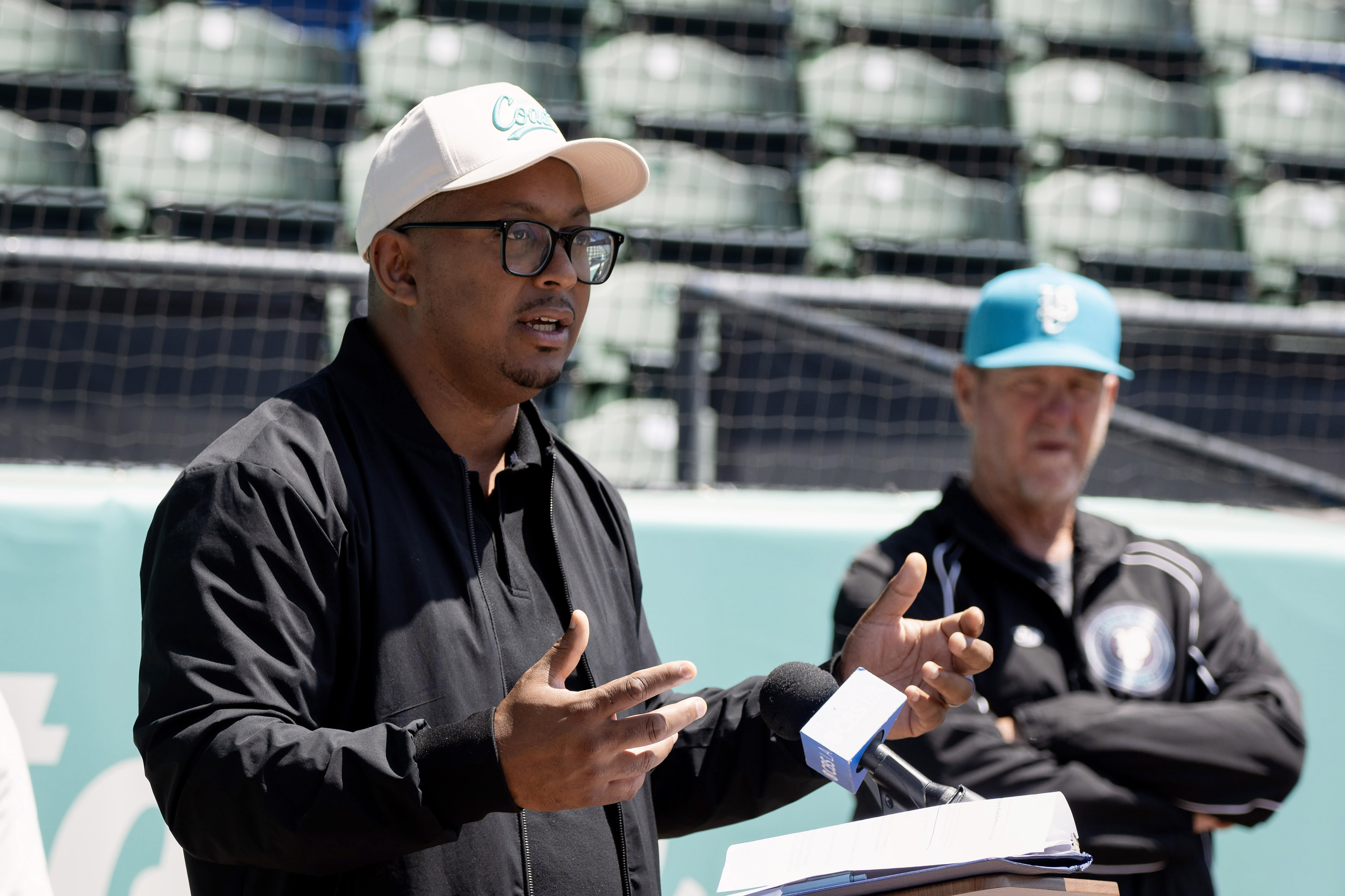 Mayor Rex Richardson, left, speaks during the Long Beach Coastâs...