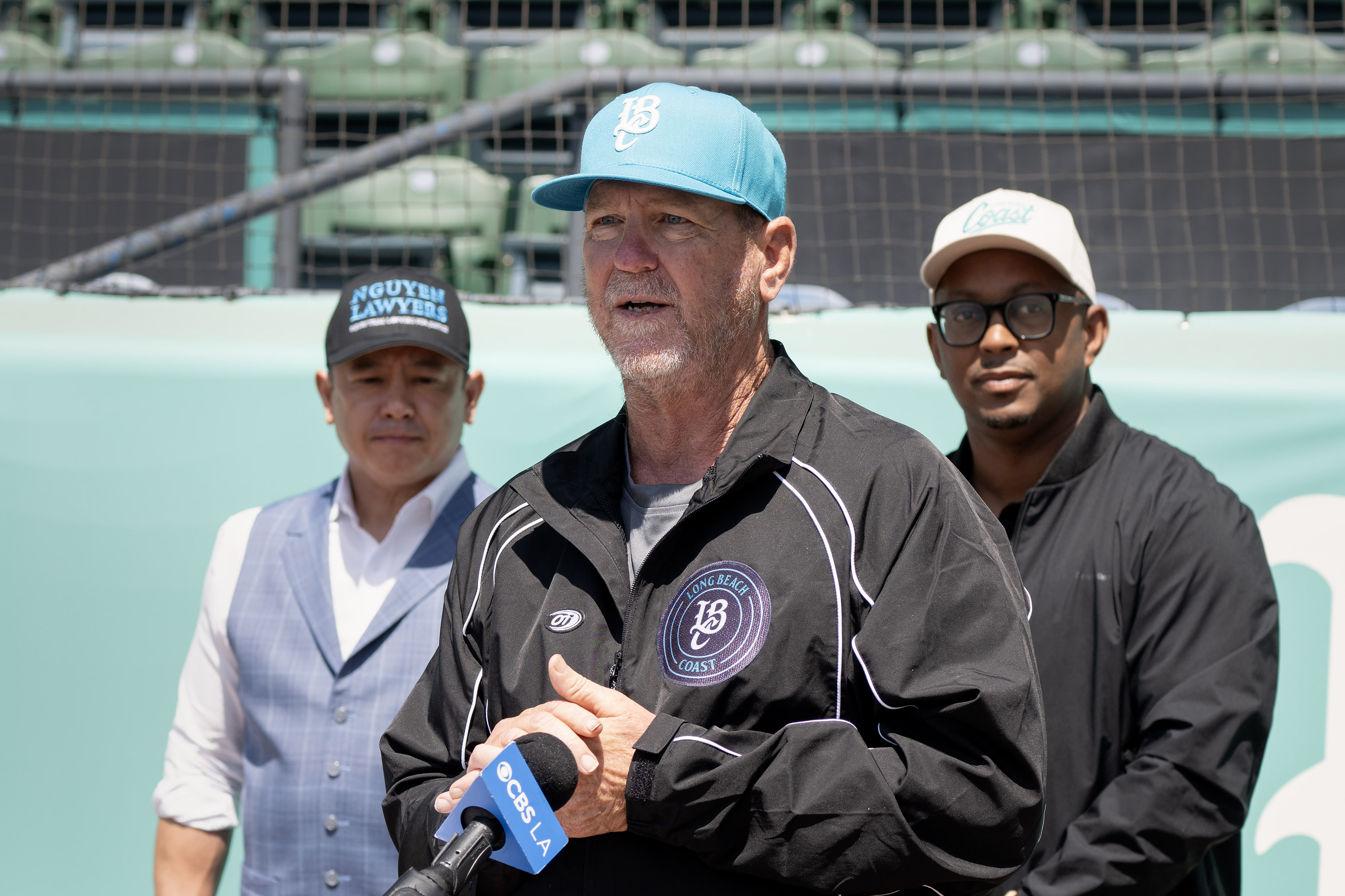 Long Beach Coast Manager Troy Percival, center, takes questions during...