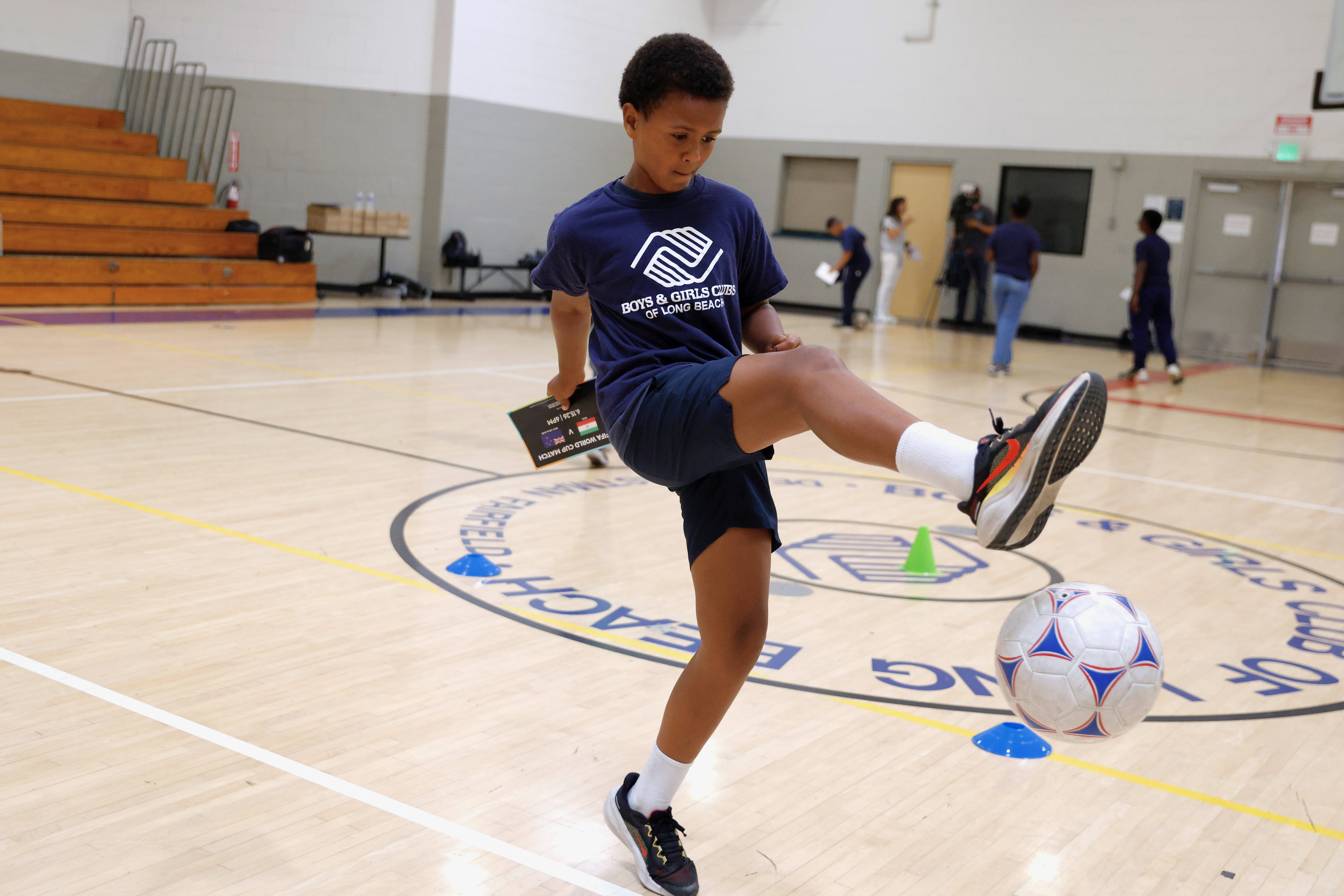 Maxwell, 10, shows off his ball-handling skills on Monday, June...