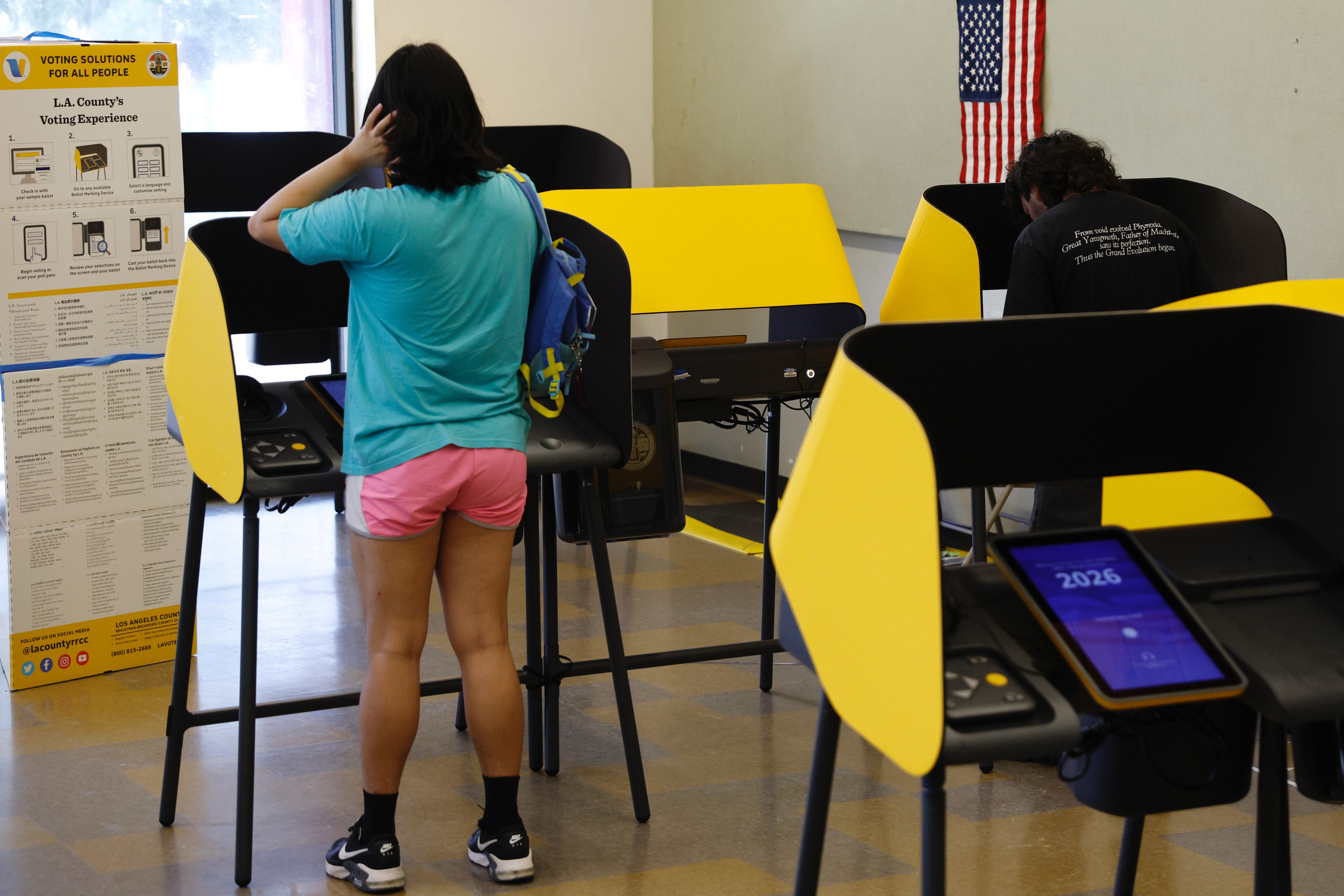 Voters cast their primary election ballots on Tuesday, June 2,...