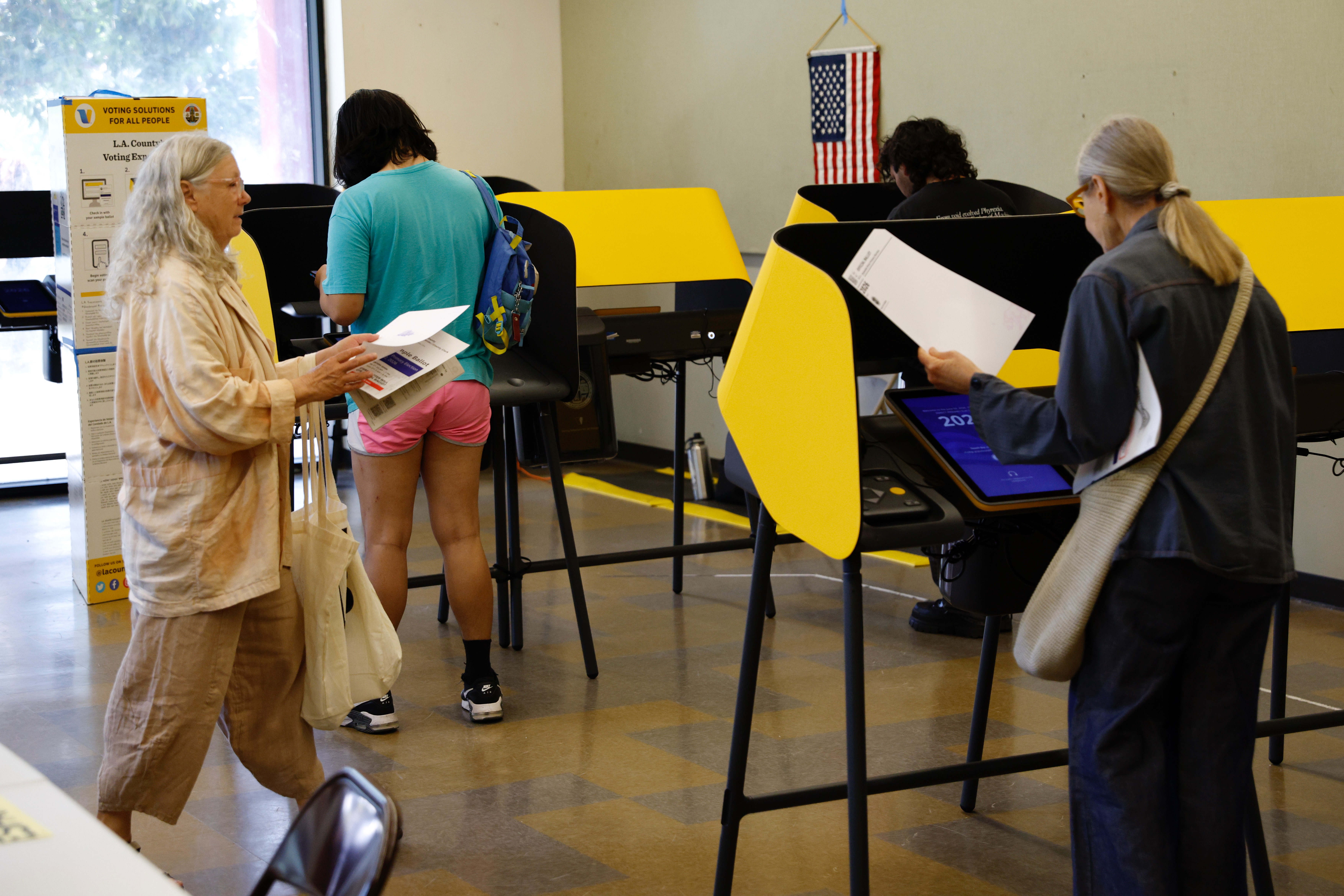 Voters cast their primary election ballots on Tuesday, June 2,...