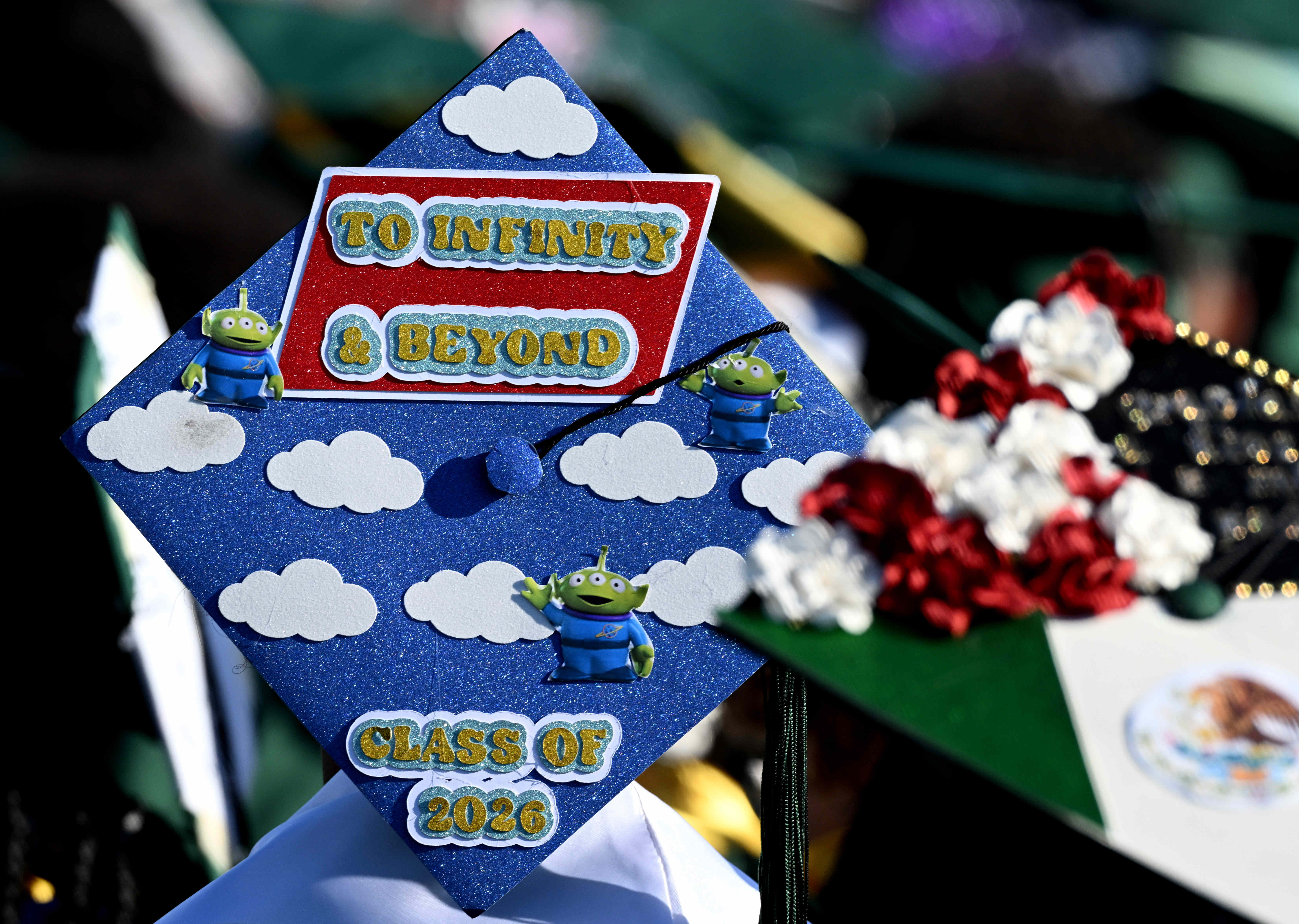 Students wear decorated mortarboards during the 2026 Cabrillo High School...