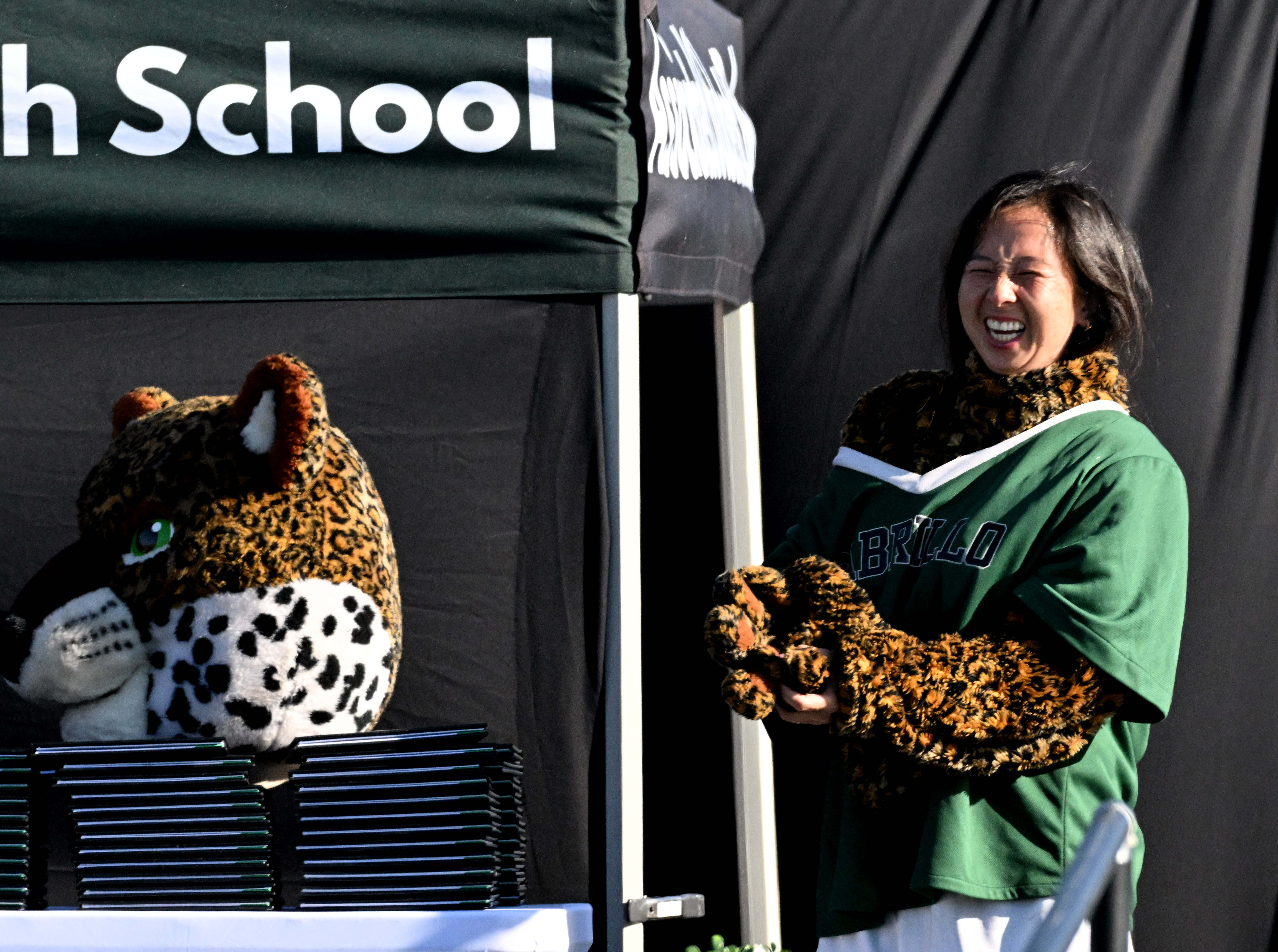 Principal Ngoc Nguyen unmasks herself during the 2026 Cabrillo High...