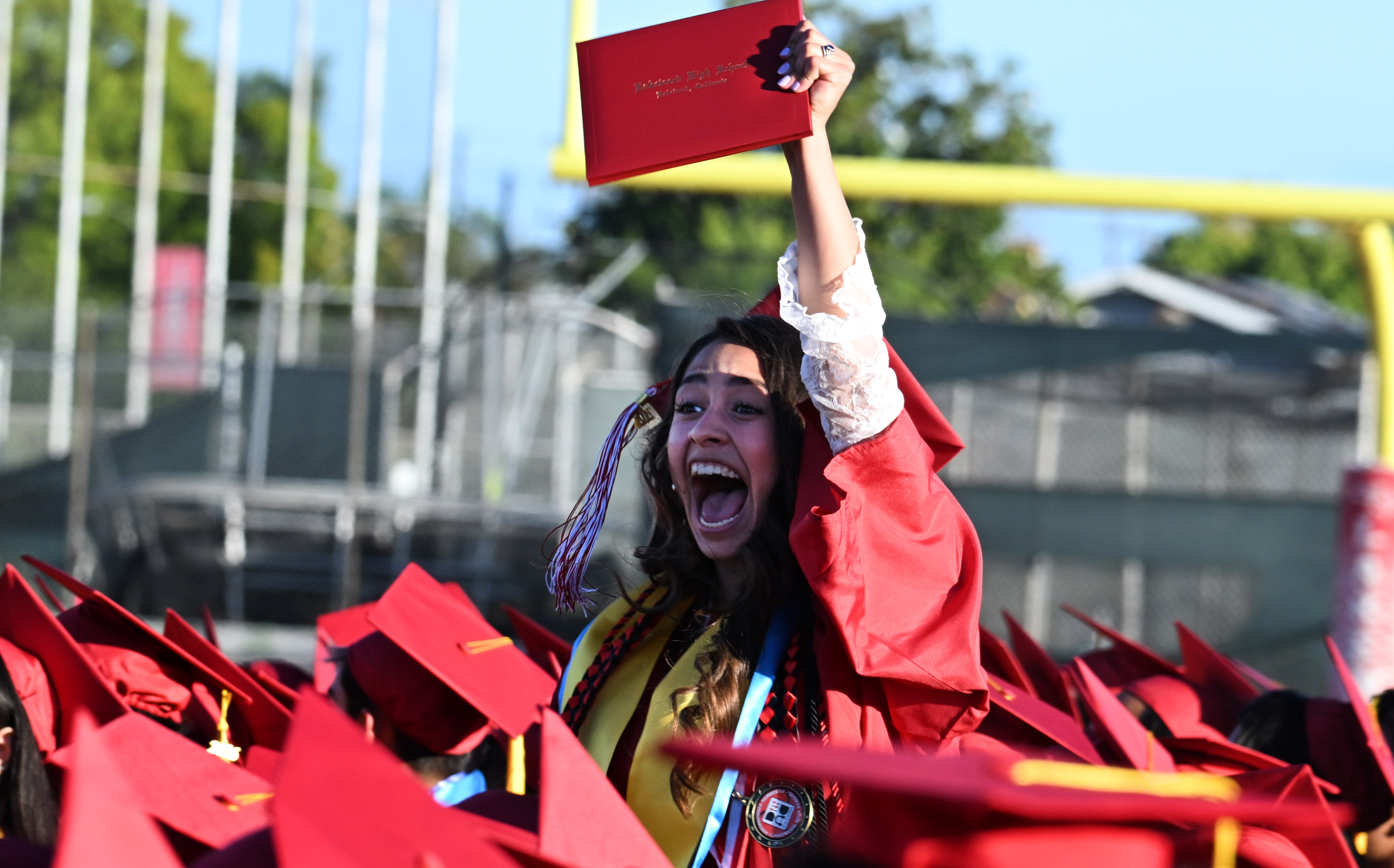 A senior cheers after receiving her diploma during the 2026...