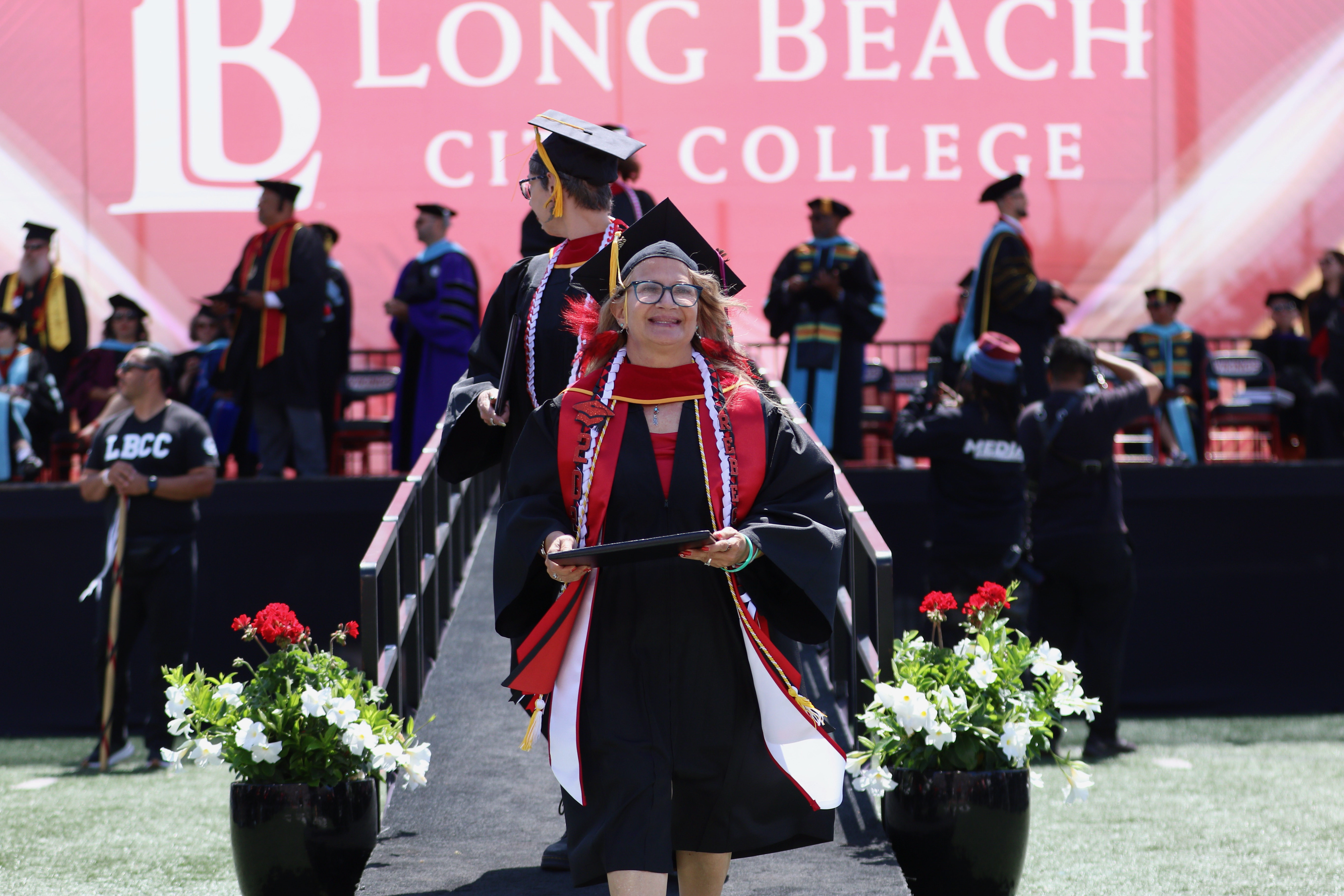 Rebecca Collins, who addressed fellow graduates about her path from...
