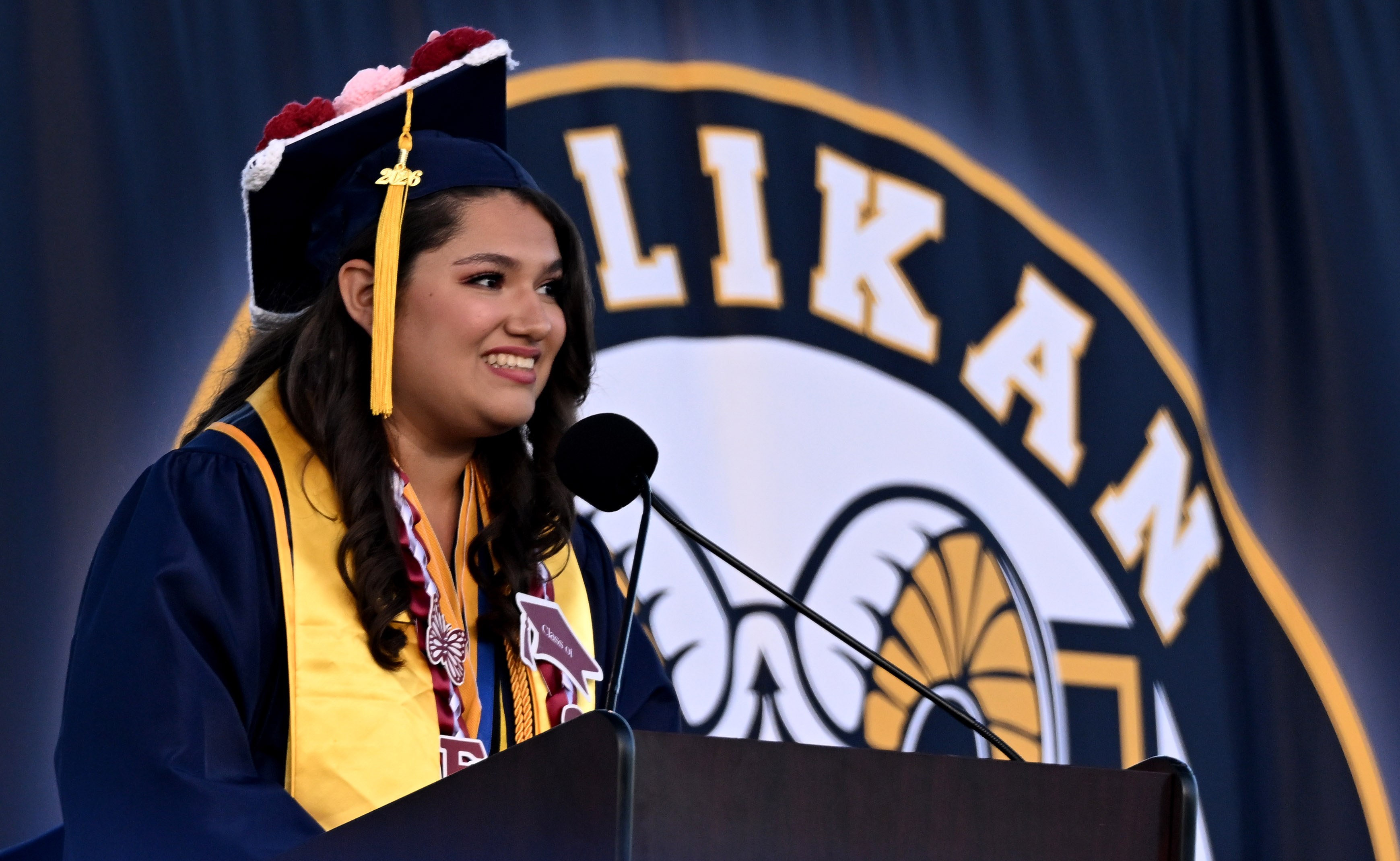 Senior Speaker Eva Flores delivers her speech âAdventure is Out...