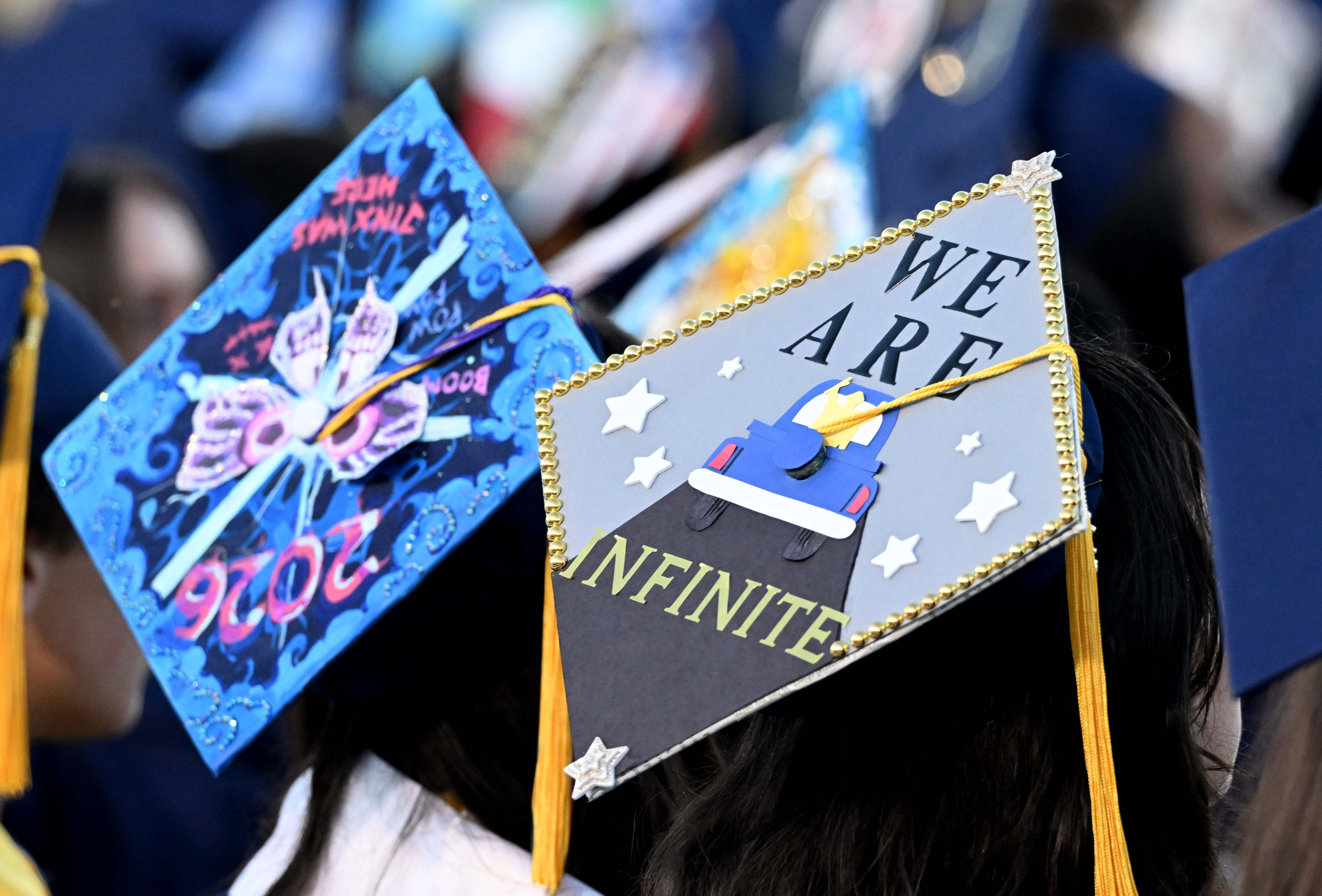 Seniors wear decorated mortarboards during the 2026 Millikan High School...