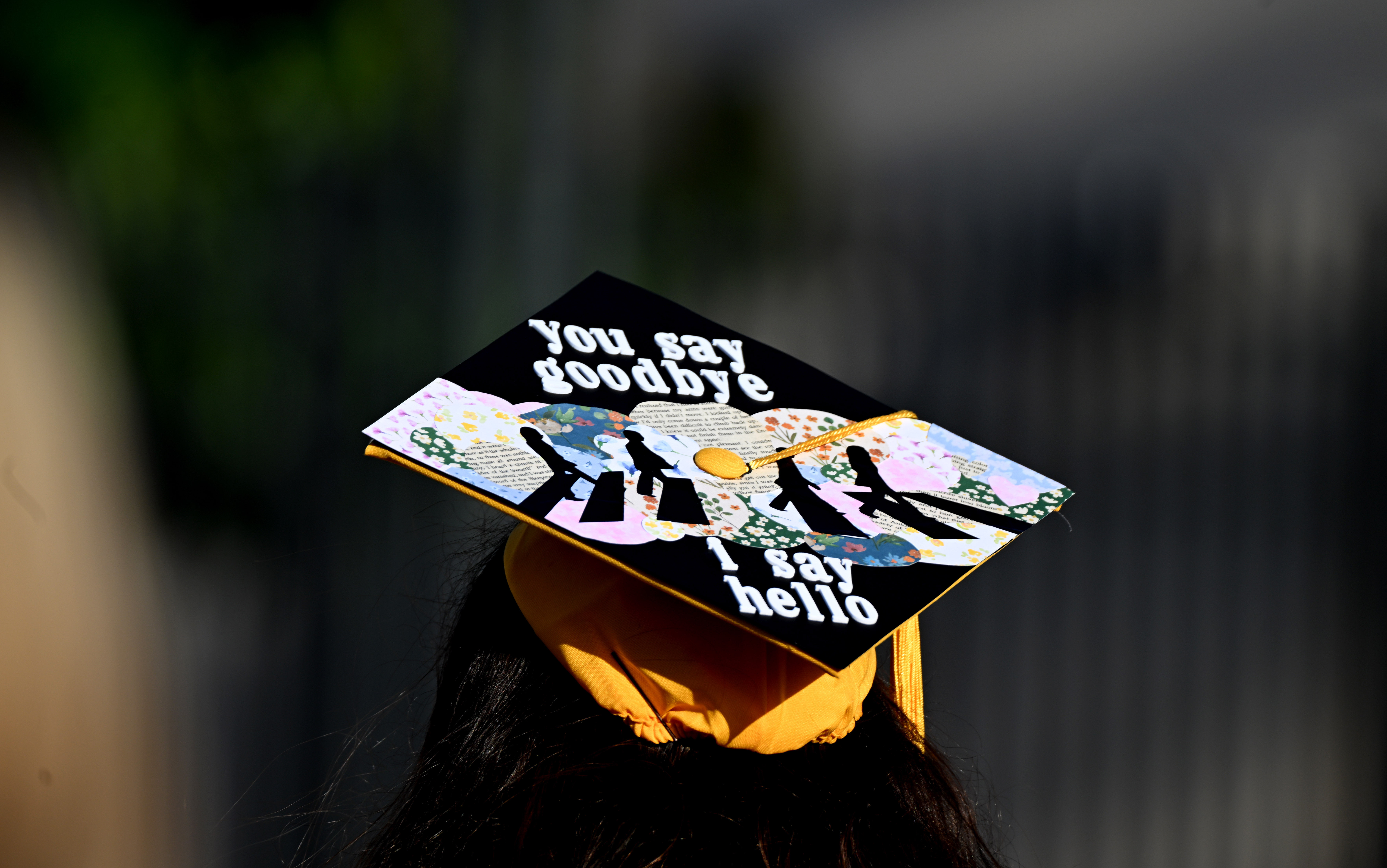 A student wears a decorated mortarboard during the 2026 Millikan...