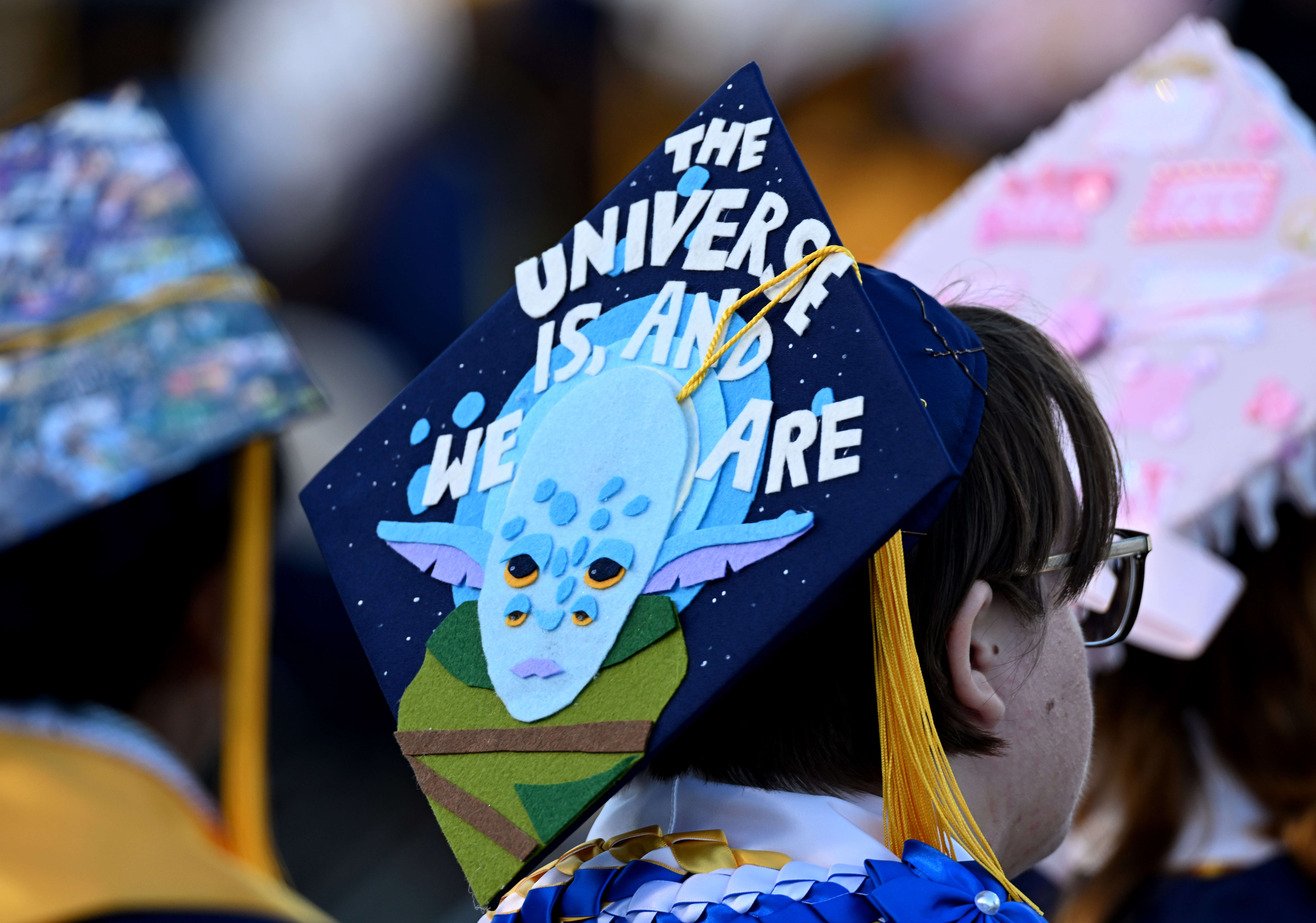 A student wears a decorated mortarboard during the 2026 Millikan...