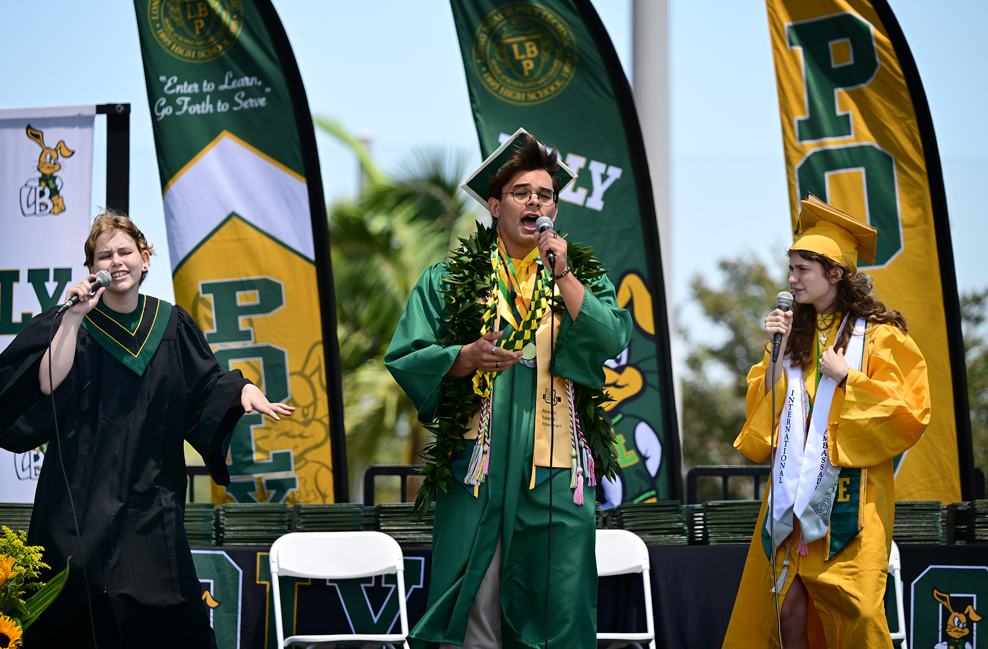 Some of the graduates sang for the crowd before the...