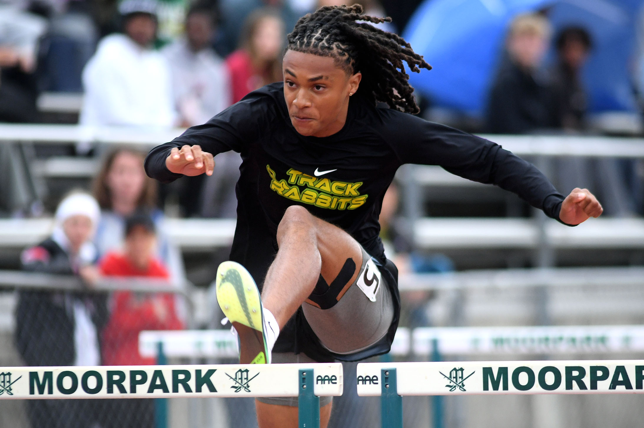 Lynnox Newton of Long Beach Poly competes in the CIF-SS...