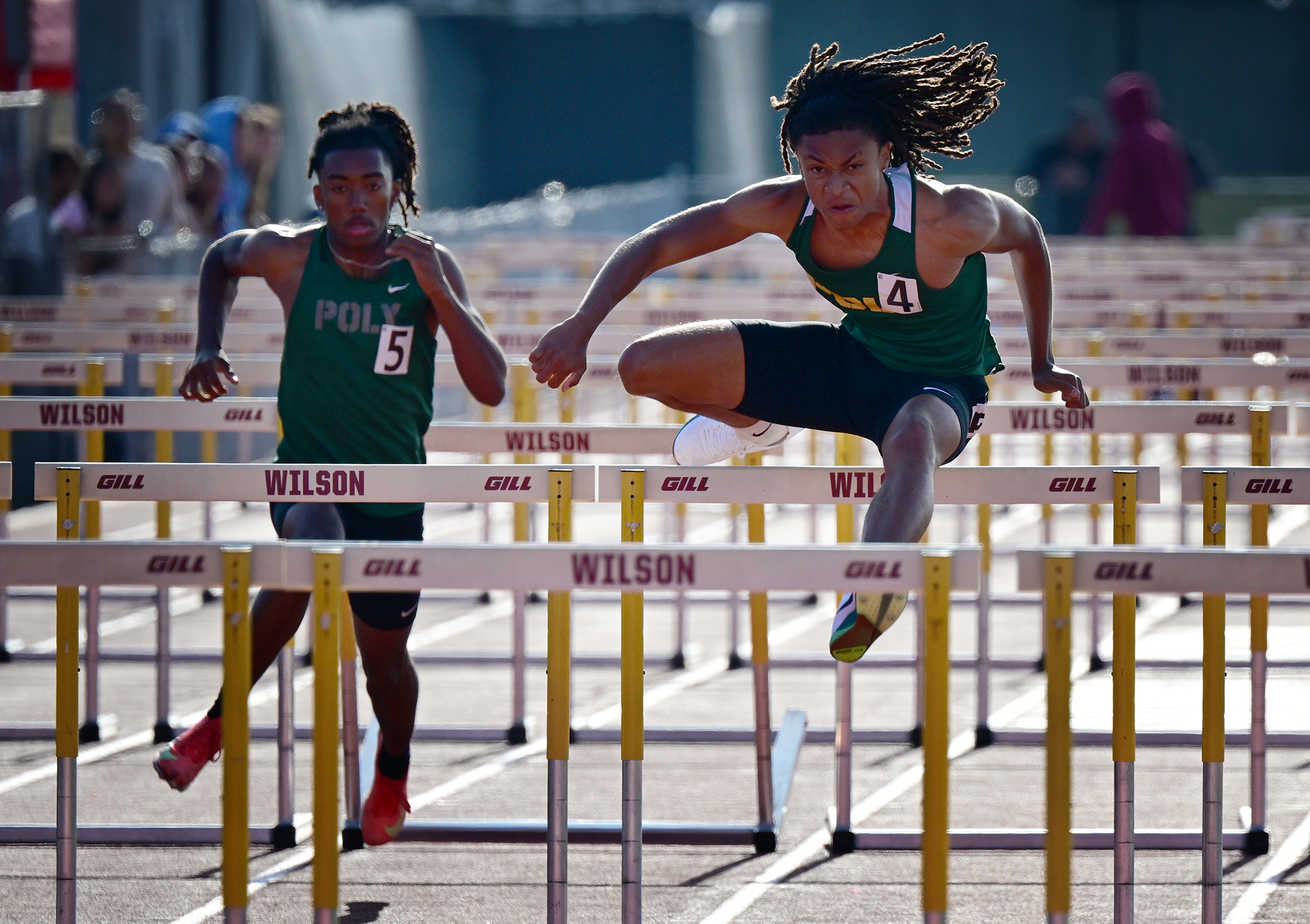Lynnox Newton from Long Beach Poly wins the 100 high...