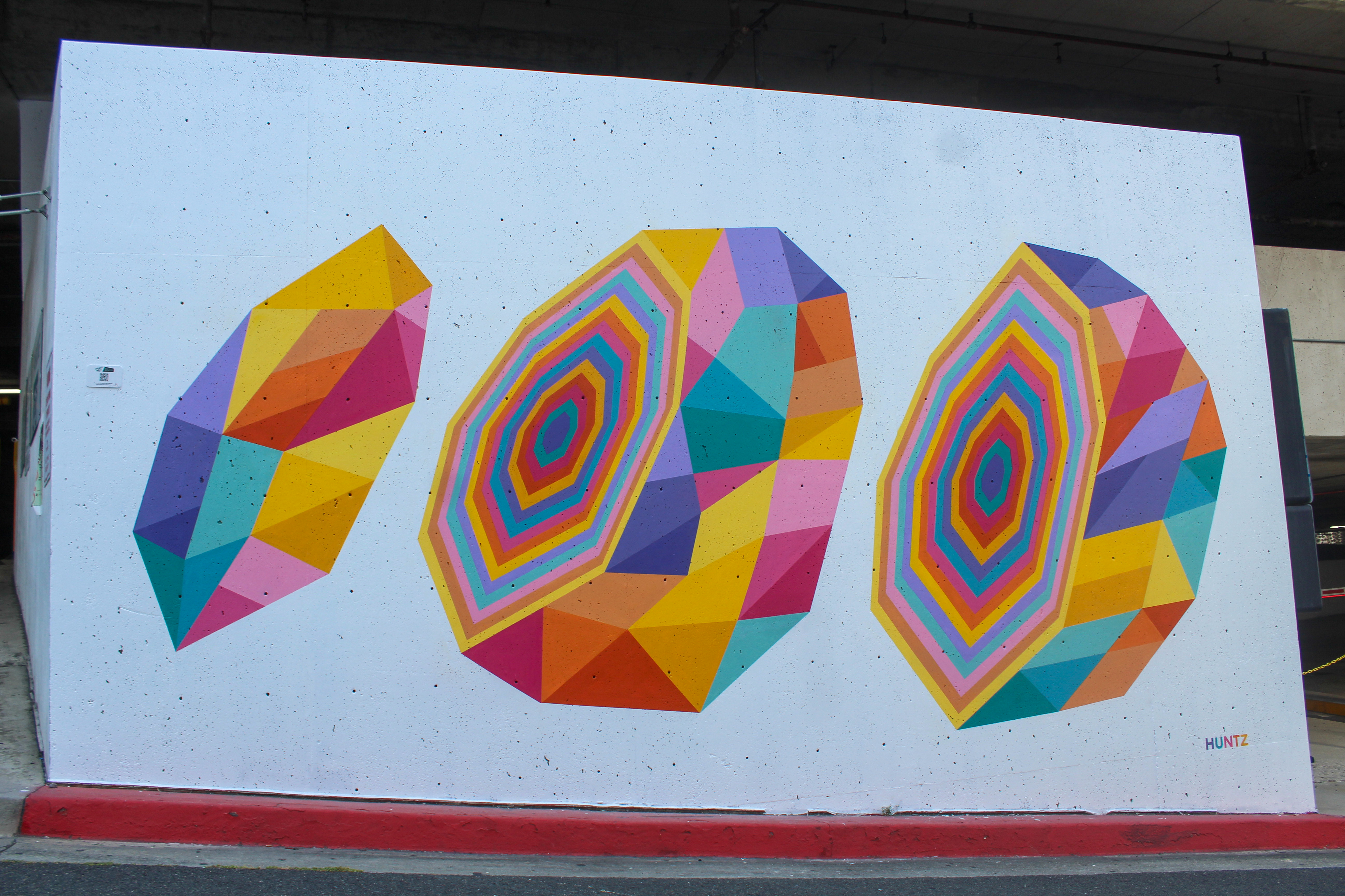 A mural by Los Angeles-based artist Huntz Liu at the...
