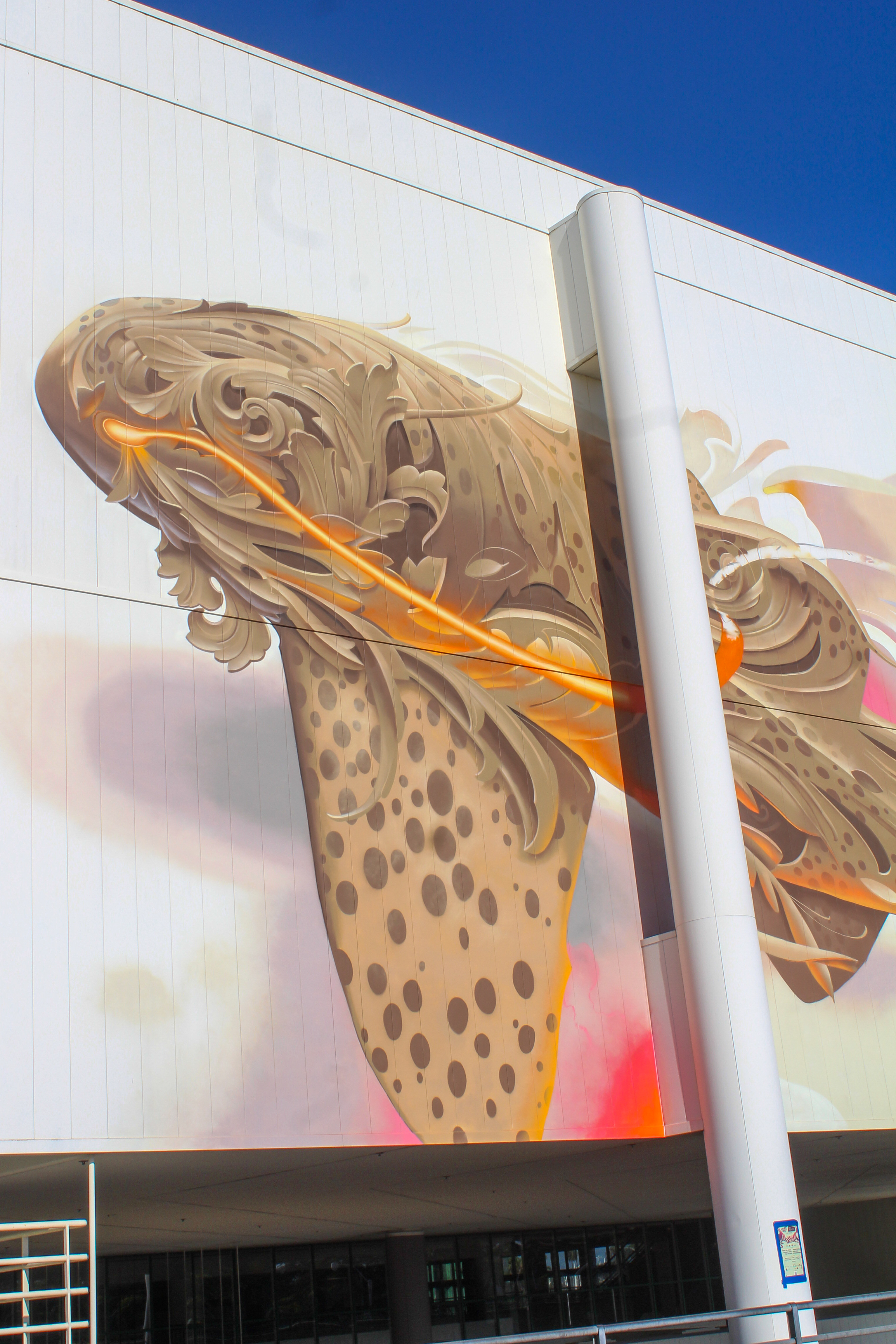 Spanish artist Bublegum finishing a mural at the Hyatt Regency...