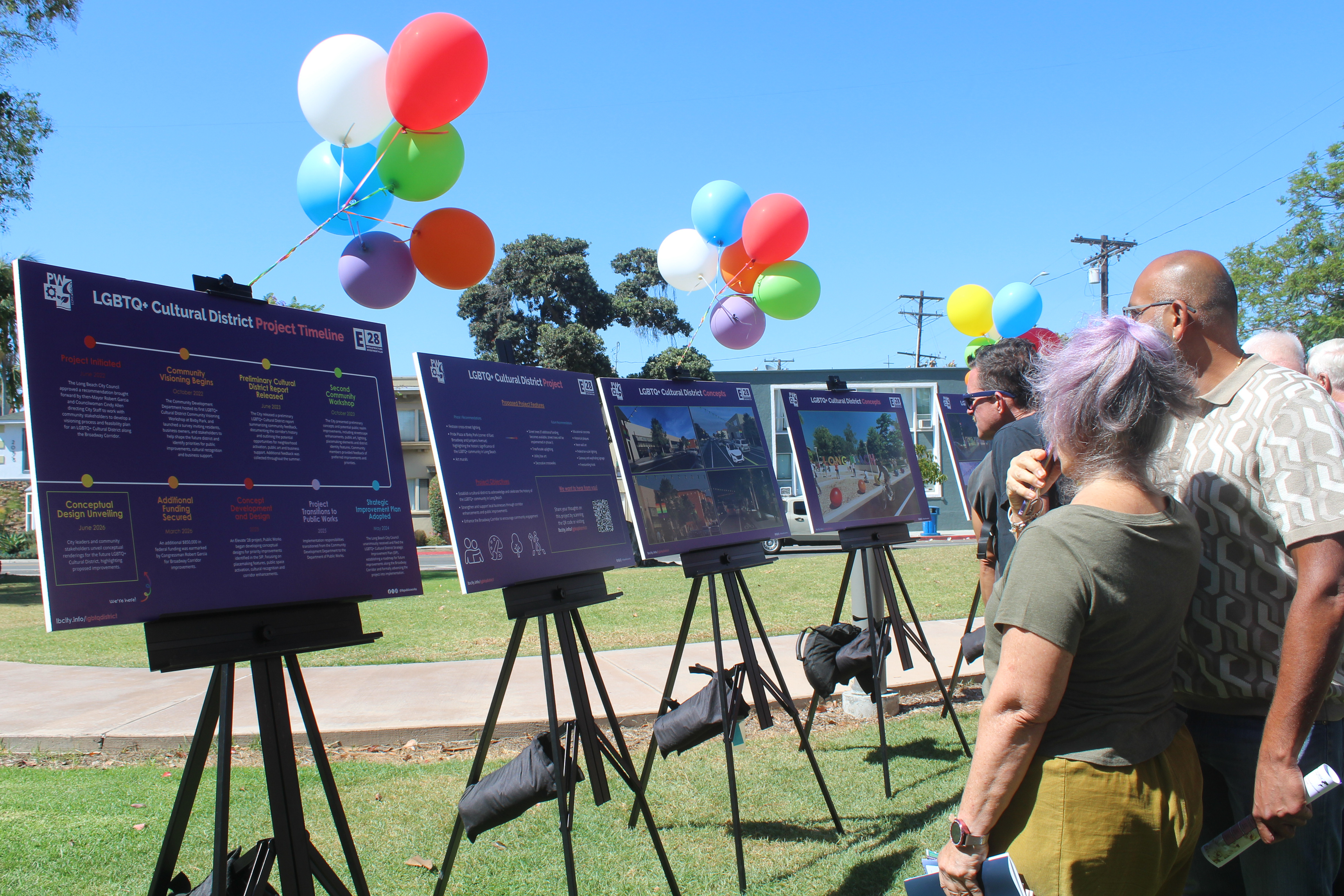 Attendees looking at the conceptual designs for Long Beach’s LGBTQ+...