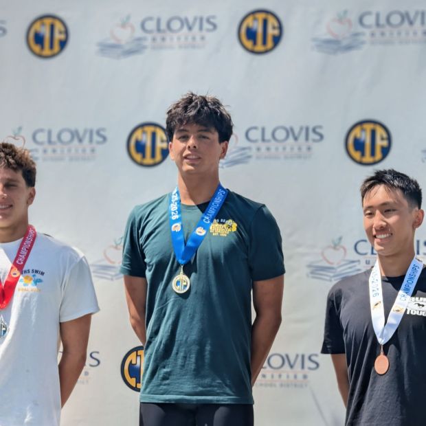 Long Beach senior Lucas Jue (centered) stands tall on the podim after winning the 500-yard freestyle title at the CIF state swimming championships at Clovis High School on Saturday, May 16, 2026. (Photo by: Ishmael Pluton, Long Beach Poly swimming)