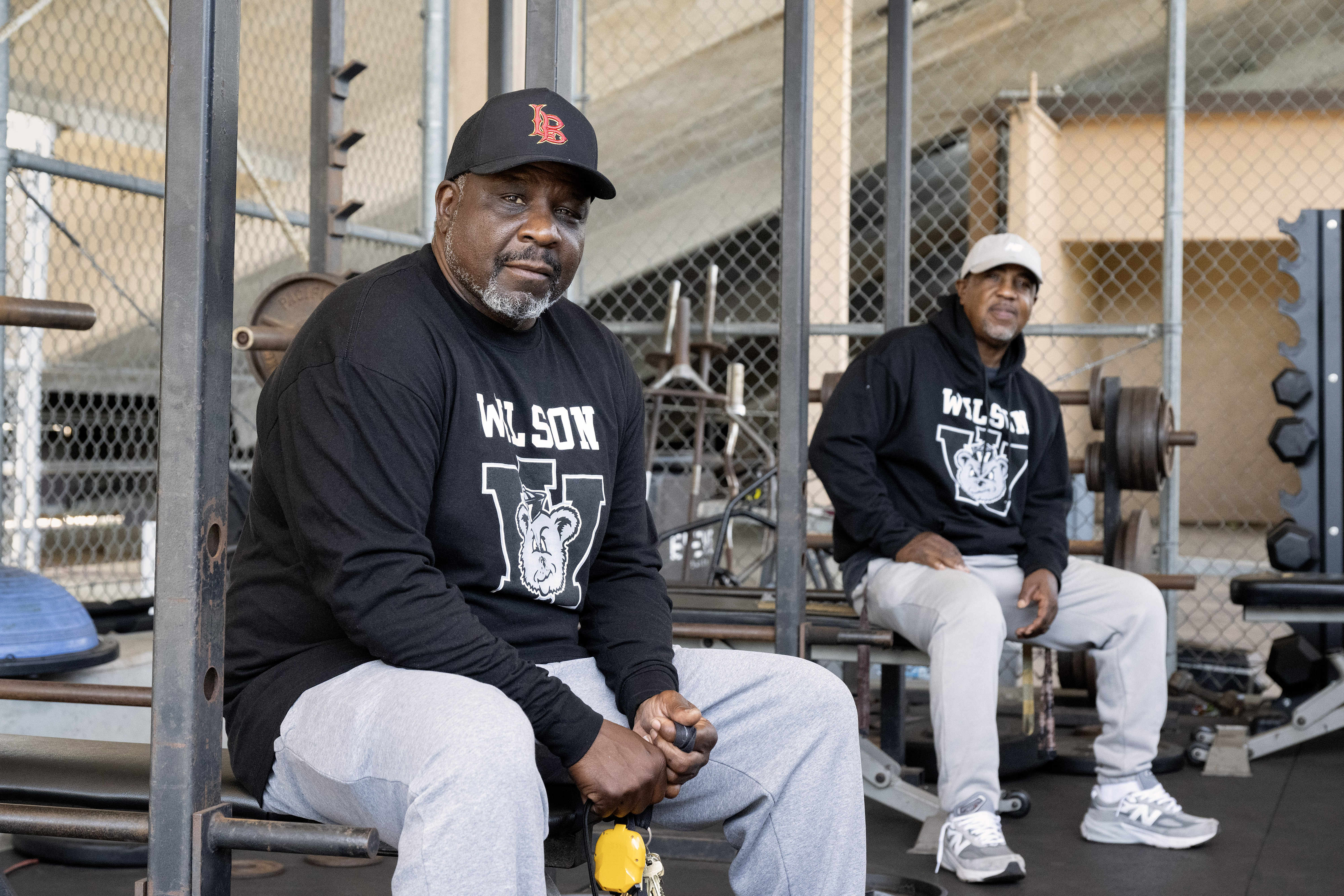 From left, Coach Shannon Fisher and Coach Neil Nelson are...