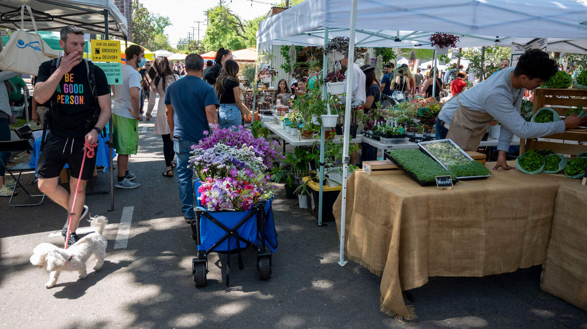 People shop at the Midtown Farmer’s Market on Saturday, April 30, 2022. It’s is a free and family-friendly year-round market that offers locally-grown fresh produce, prepared foods, artisan crafters and more. People shop at the Midtown Farmer’s Market on Saturday, April 30, 2022. It’s is a free and family-friendly year-round market that offers locally-grown fresh produce, prepared foods, artisan crafters and more.