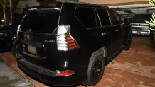Police took this picture of Larry Millete's black Lexus SUV during a search of his home in 2021.