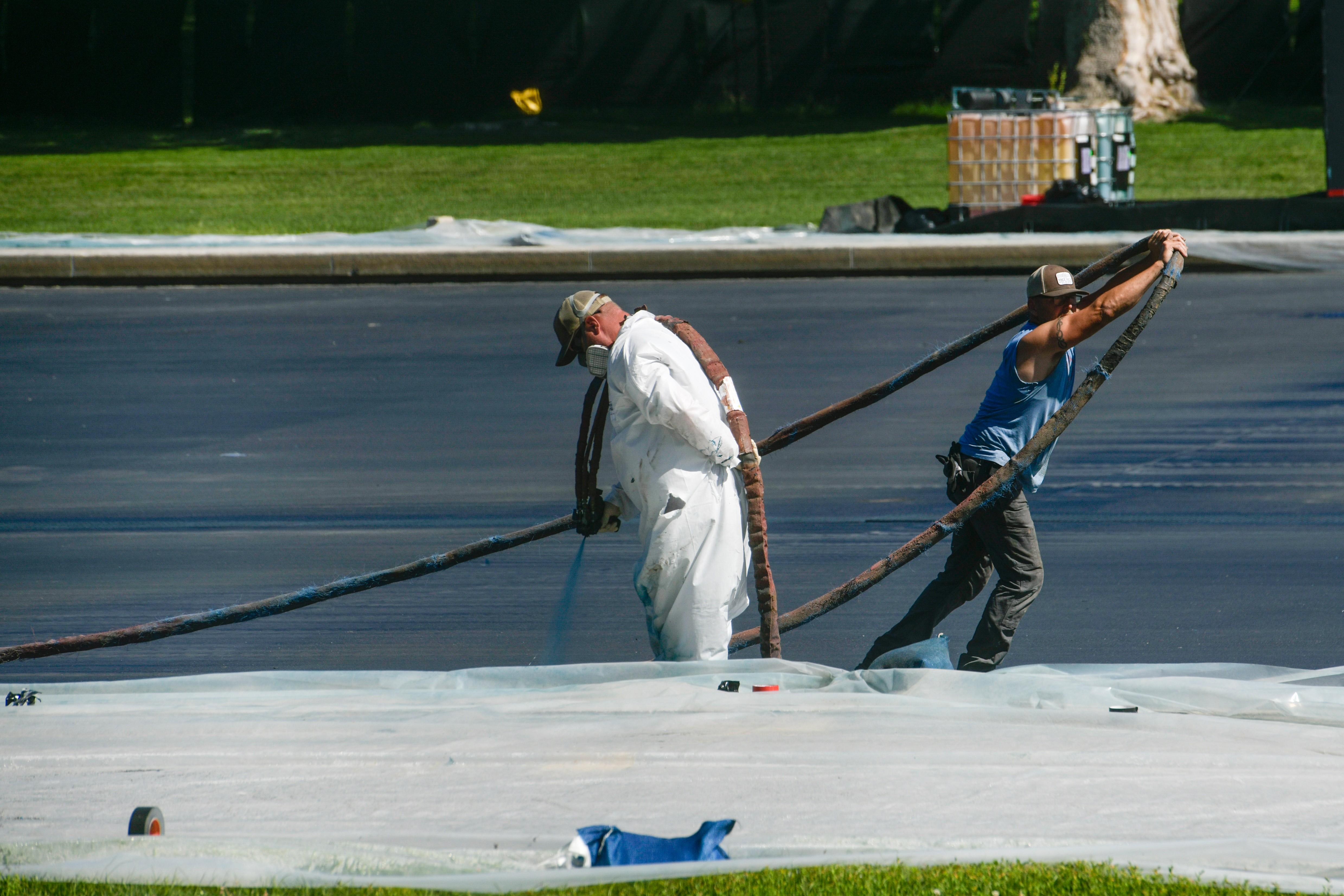 Work continues on the Lincoln Memorial Reflecting Pool, which is...
