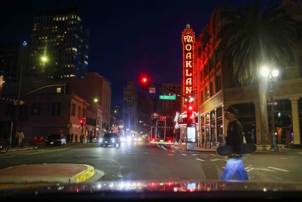 The Oakland Fox Theater is visible during the Oakland First Fridays event along Telegraph Avenue in Oakland, Calif., Friday, April 3, 2026. (Ray Chavez/Bay Area News Group)