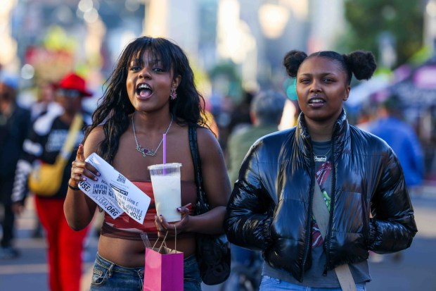 Festivalgoers attend the Oakland First Fridays event along Telegraph Avenue in Oakland, Calif., Friday, April 3, 2026. (Ray Chavez/Bay Area News Group)