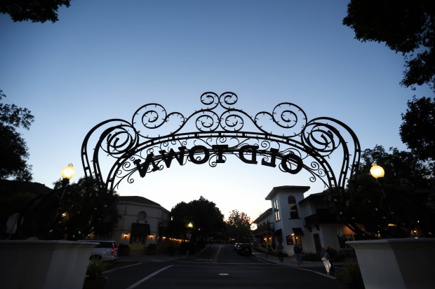 Old Town sign hangs over the popular shopping plaza in Los Gatos on Friday, April 17, 2026. (Shae Hammond/Bay Area News Group)