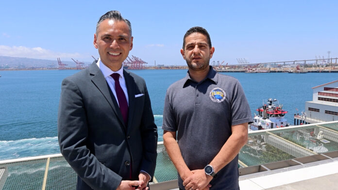 No-Play_noel_mario ILWU Local 13 President Mario “Moe” Medina joined Port of Long Beach CEO Dr. Noel Hacegaba to announce the impressive cargo numbers for May.