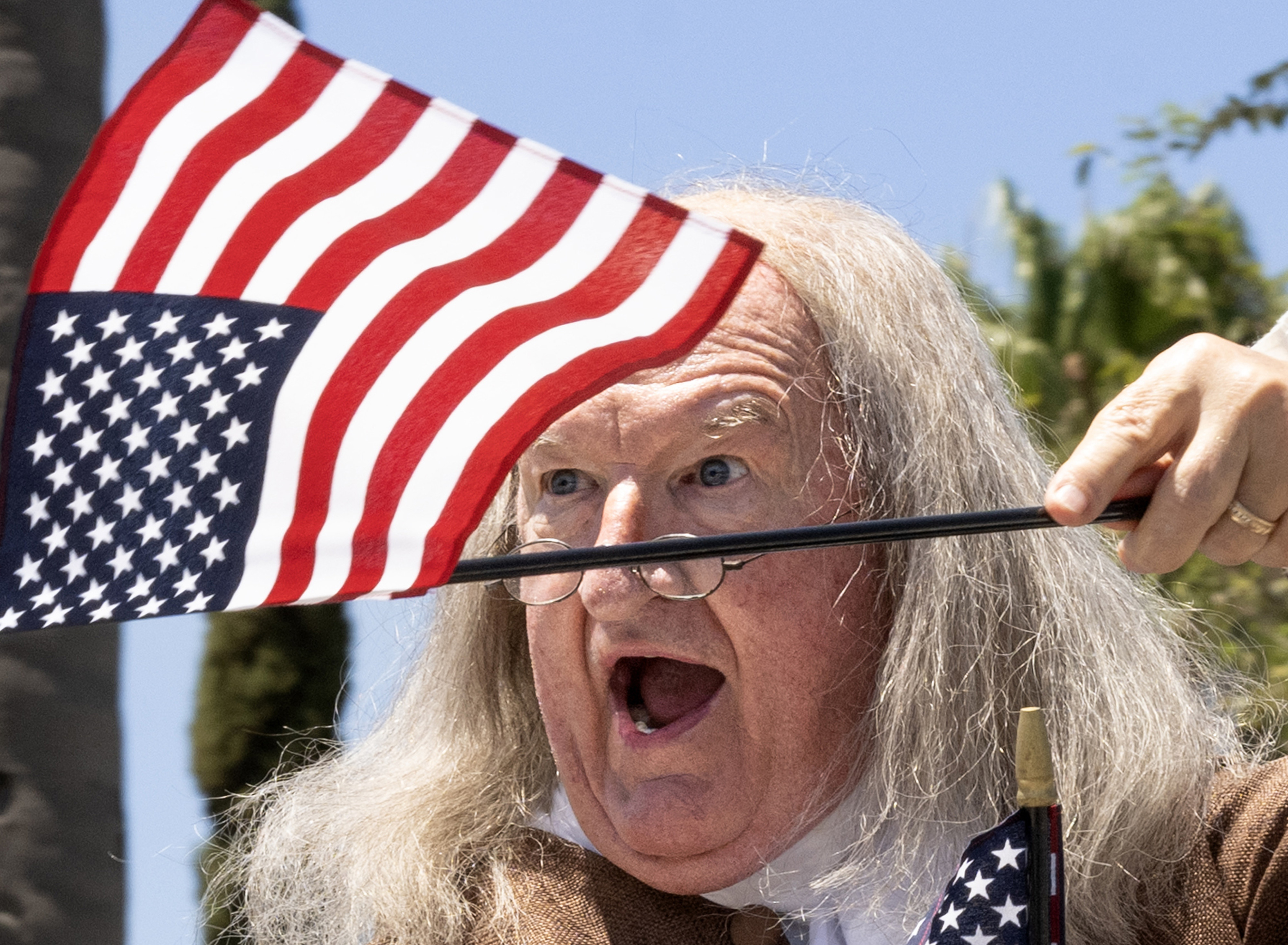in Franklin imparts wise words to the crowd as he...