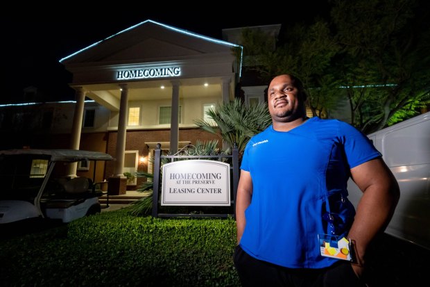 Randy Furbush, 24, stands outside his apartment complex in Homecoming at the Preserve in Chino on Tuesday, Feb. 8, 2022. Furbush has recently moved into his one-bedroom apartment after failing to find affordable housing in Orange County where he works in healthcare. (Photo by Watchara Phomicinda, The Press-Enterprise/SCNG)