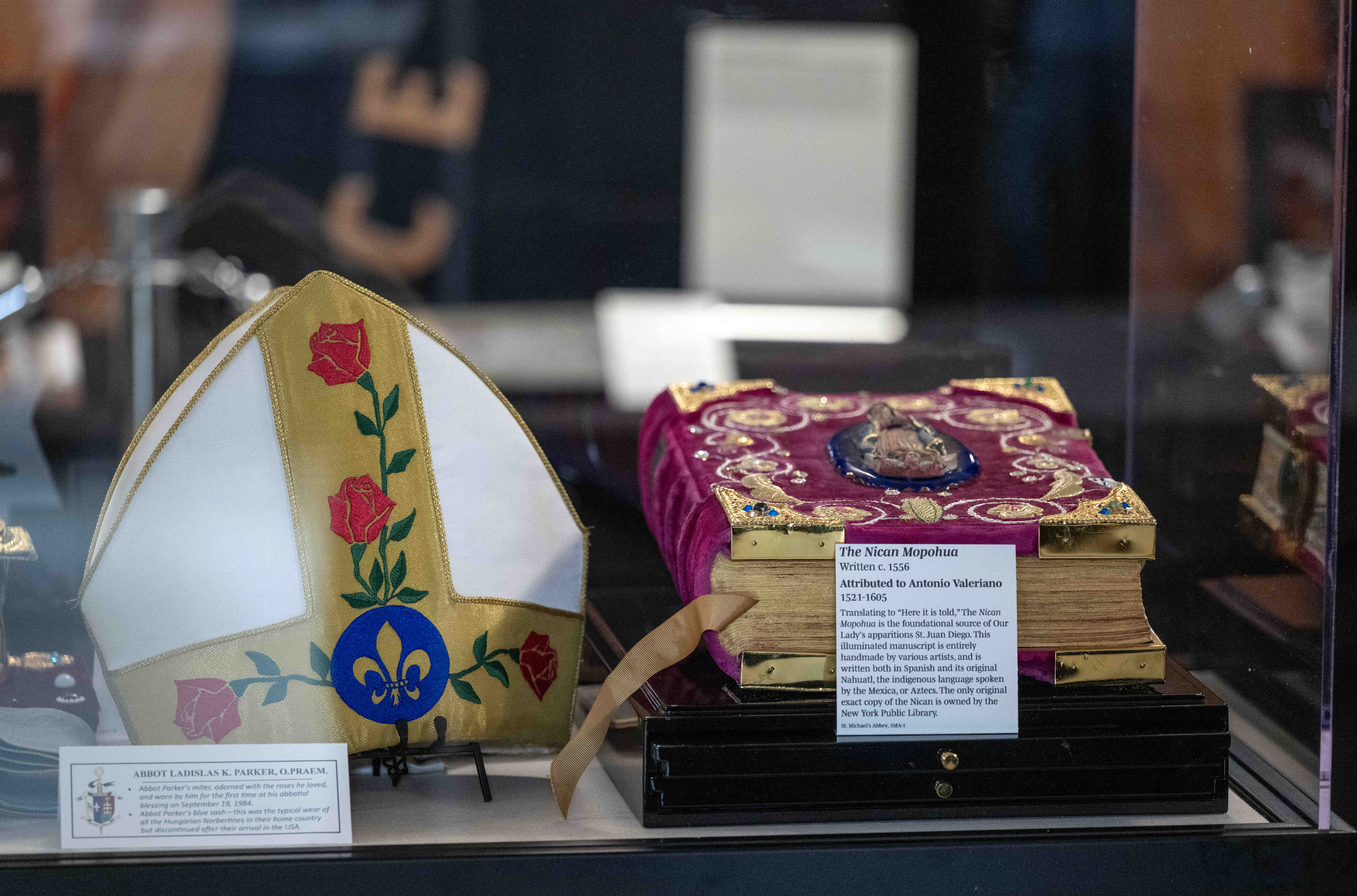 A collection of historical relics and documents sits on display...