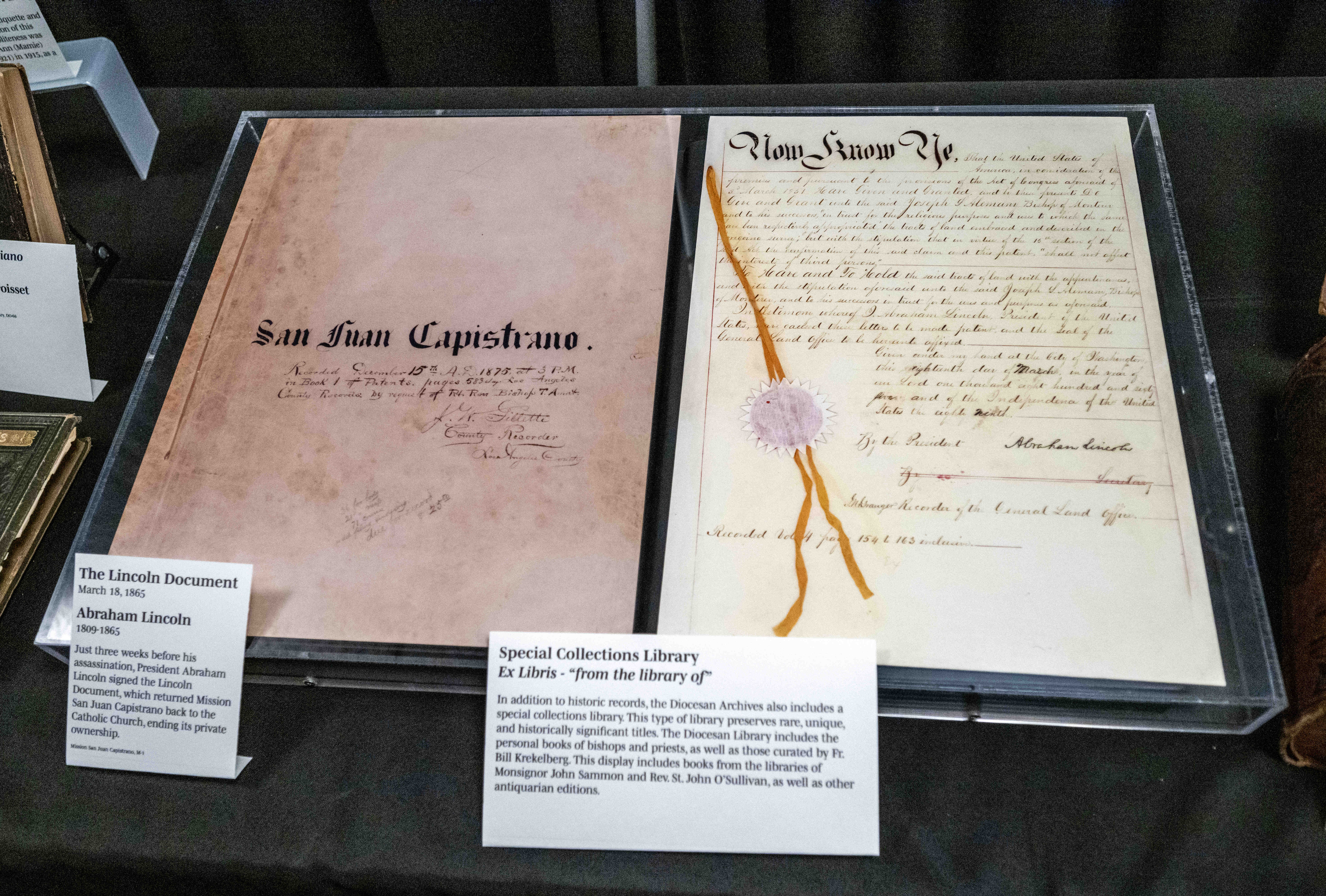 A replica of a document signed by President Abraham Lincoln,...