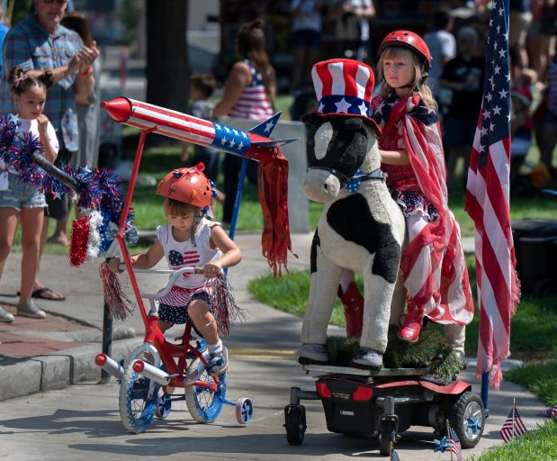 Children show off their patriotic wheels during the Brea County Fair's 41st annual event featuring food, games, rides and dog and baby contests on Saturday, July 3, 2021. (Photo by Mindy Schauer, Orange County Register/SCNG)
