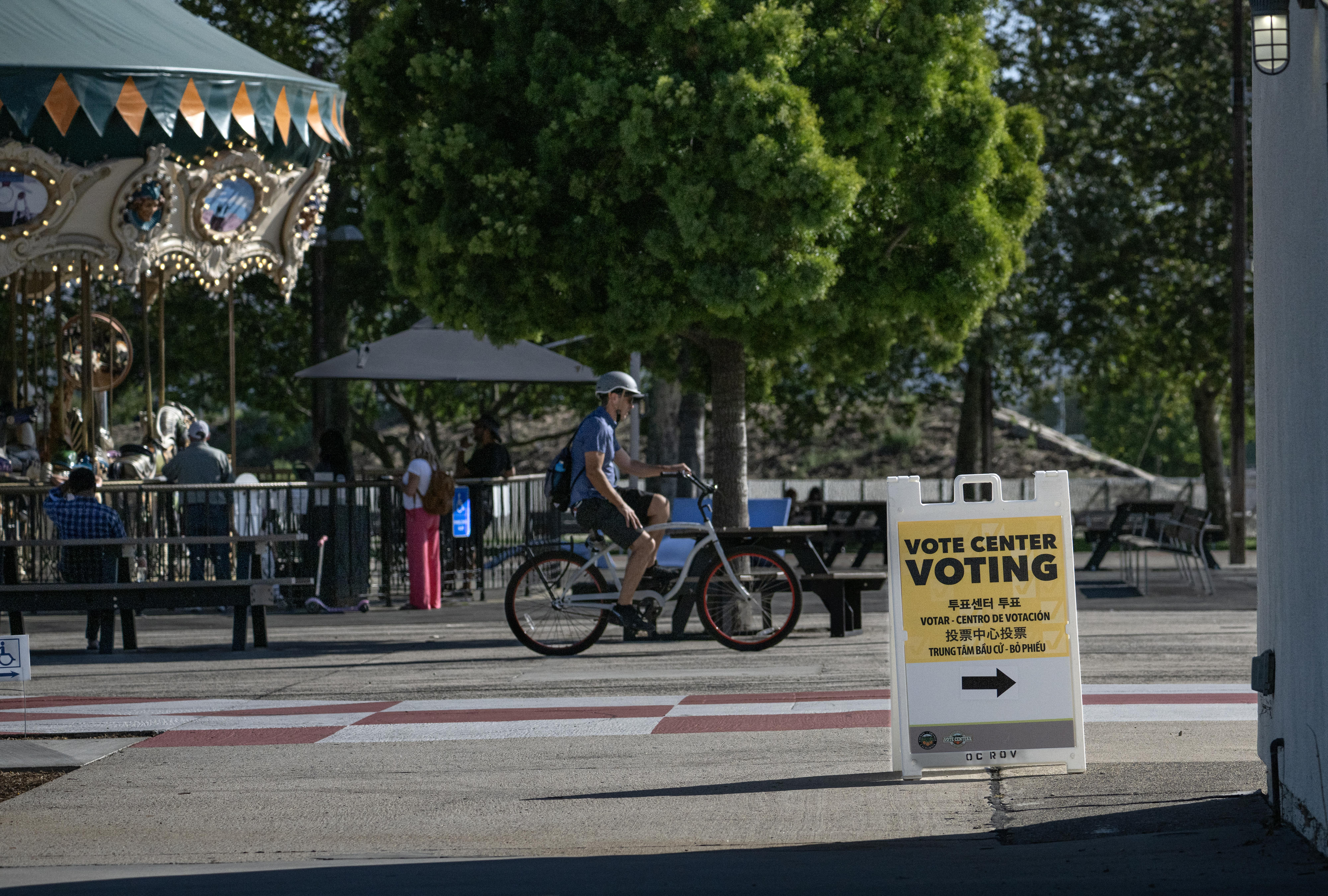 Voting center signs direct would-be voters to the polling place...