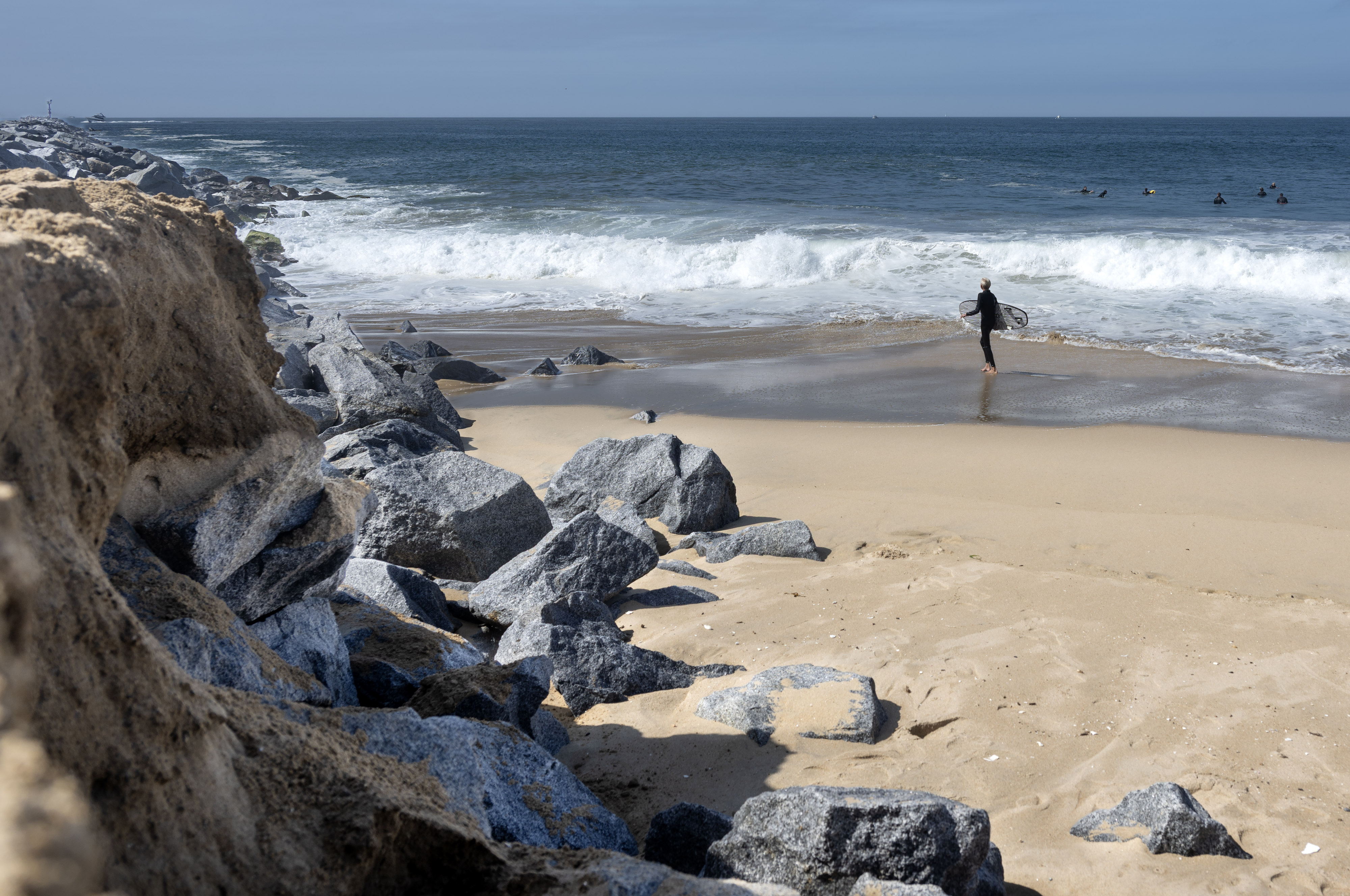 Rocks formally covered by sand are now exposed from erosion...