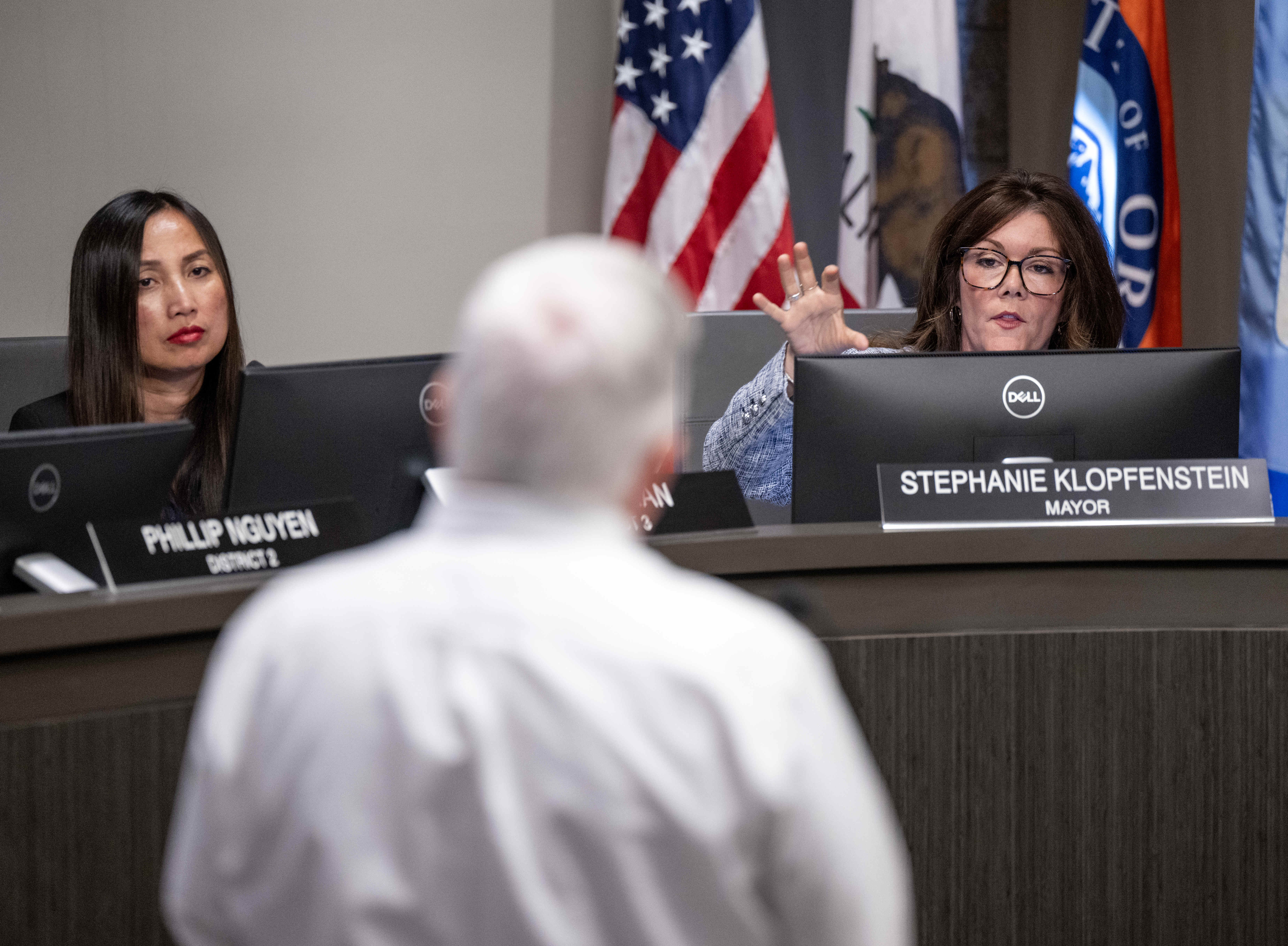 Garden Grove Mayor Stephanie Klopfenstein, right, addresses GKN Aerospace Senior...