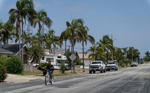 A man rides his bike on Santa Rosalia Street near the GKN Aerospace property in Garden Grove on Friday, June 5, 2026. More than 50,000 people were evacuated around the plant after a chemical tank became unstable and threatened to melt down. (Photo by Paul Bersebach, Orange County Register/SCNG)