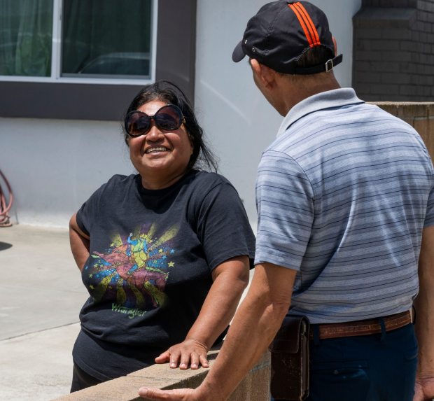 Santa Rosalia Street resident Josefina Peralta talks with her neighbor Thành Tran about living near the GKN Aerospace property in Garden Grove on Friday, June 5, 2026. Their back yards look onto the GKN Aerospace propert. More than 50,000 people were evacuated, including Peralta and Tran, around the plant after chemical tanks began leaking. (Photo by Paul Bersebach, Orange County Register/SCNG)