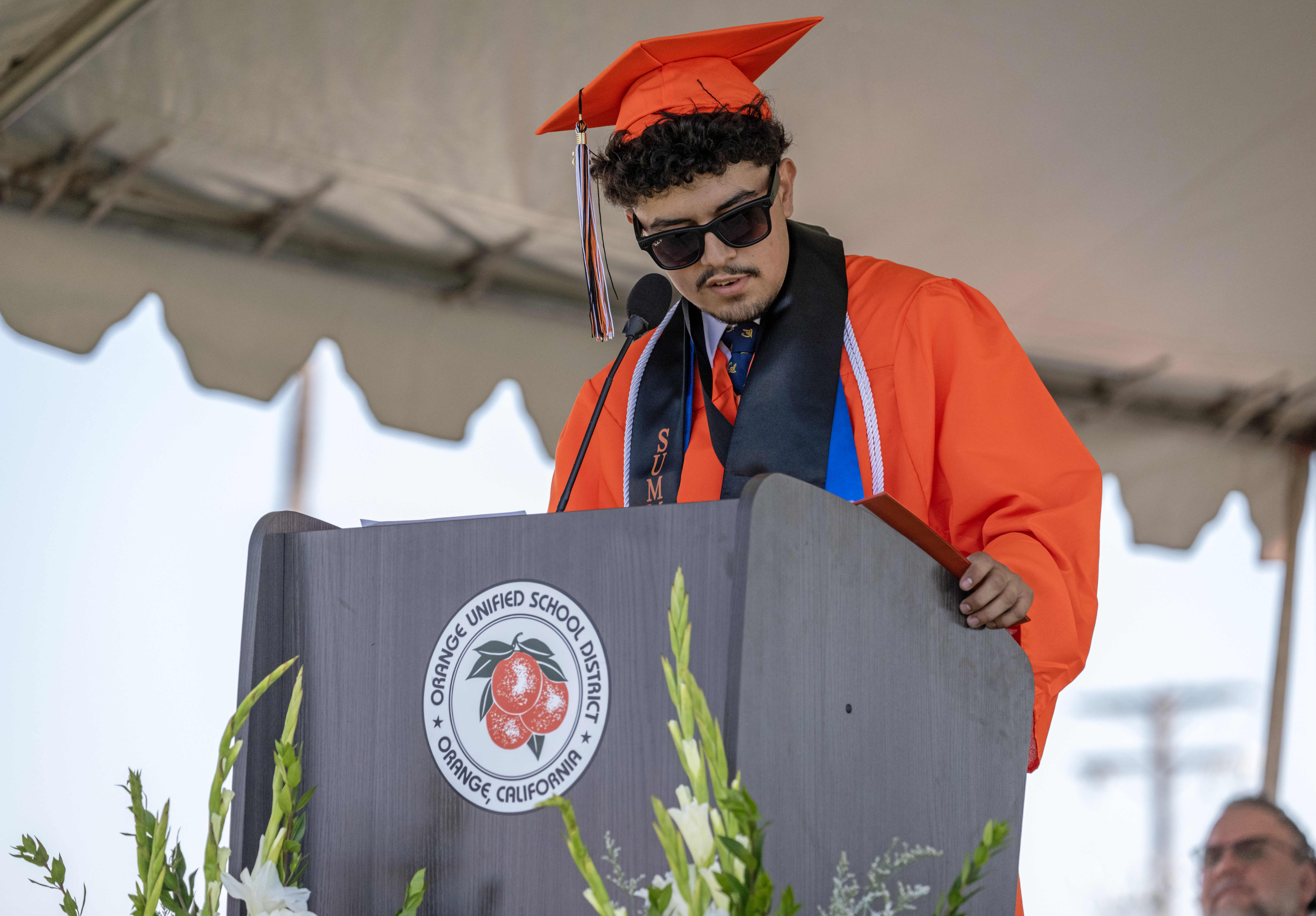 Kevin Salazar delivers the Valedictoriansâ Address during the Orange High...