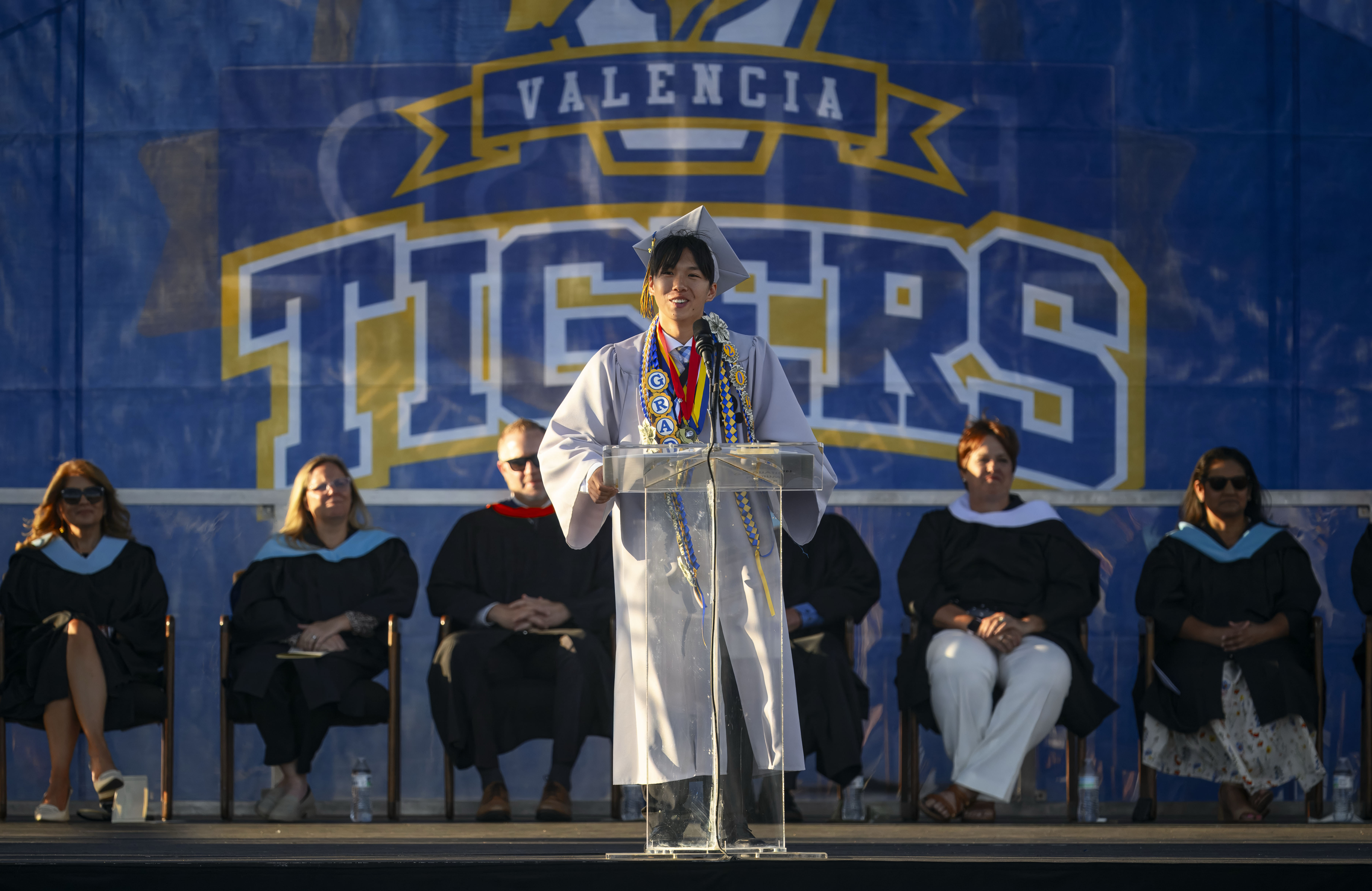 Dylan Nguyen delivers one of the commencement addresses during the...