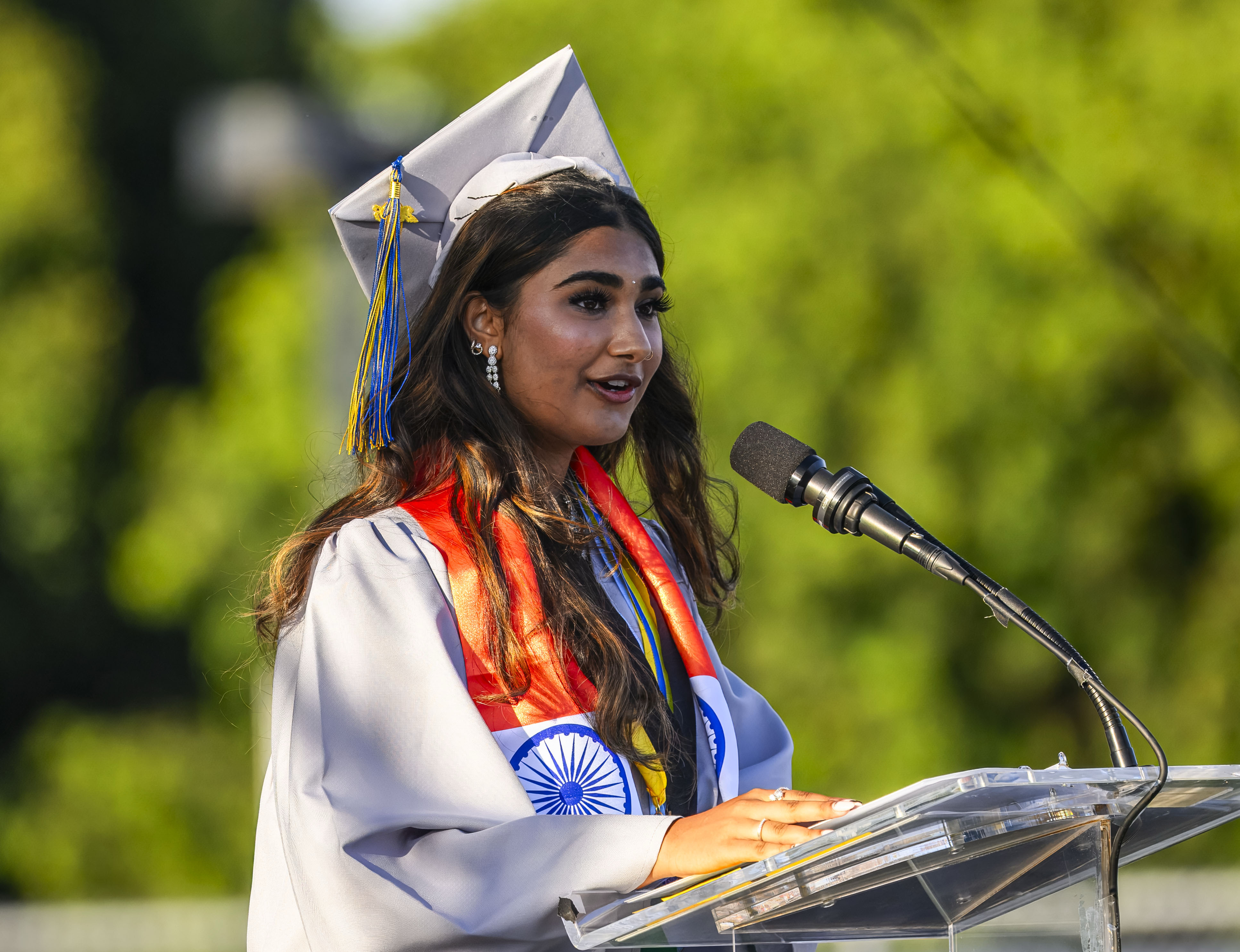 Sanjana Sawant delivers one of the commencement addresses during the...